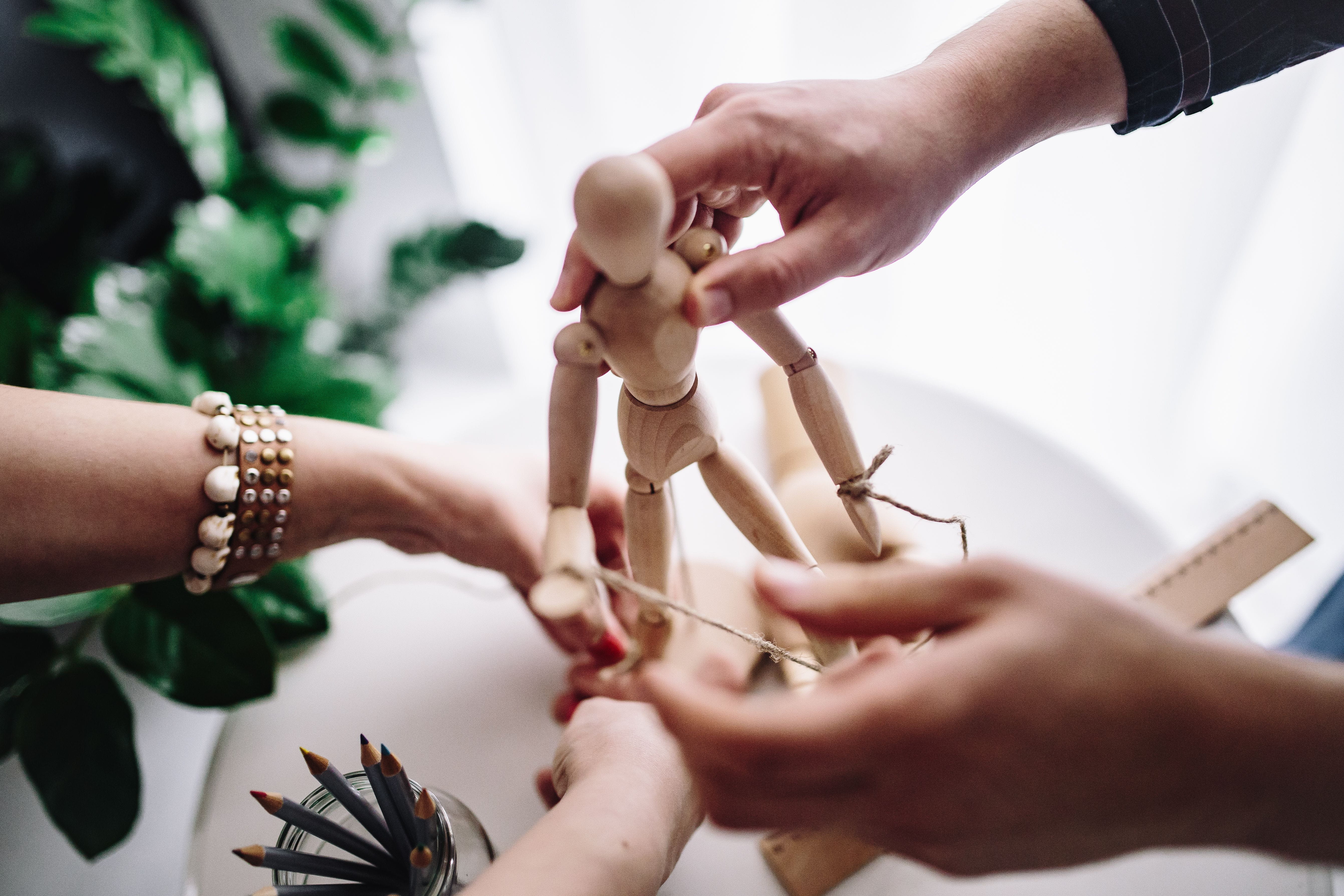 finger, doll, focus on foreground, pencils, men, leisure activity, women, dummy, working, 5K, holding, high angle view, real people, females, human Hand, HD Wallpaper