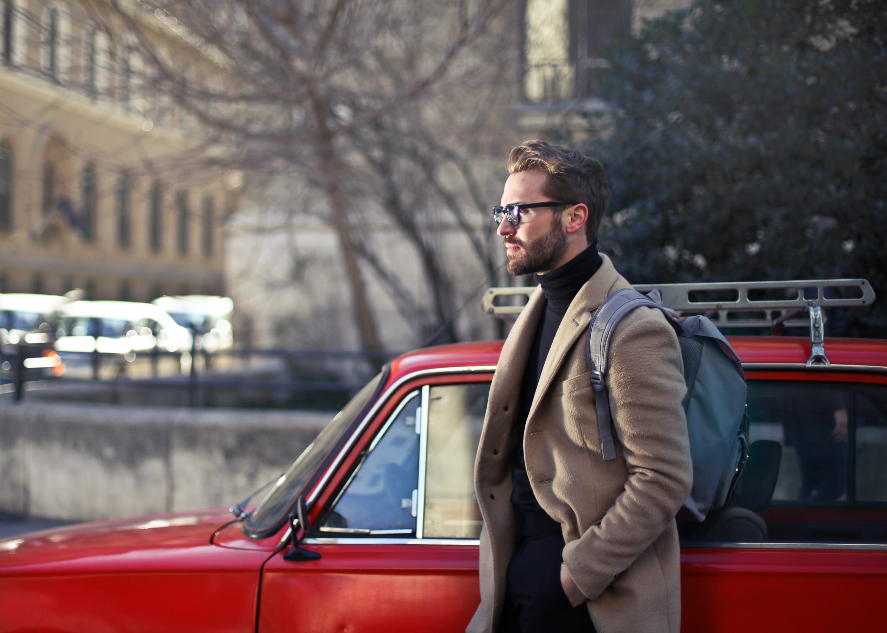 city, day, real people, beige, camel overcoat, jacket, beside, road, lifestyles, modern, standing, specs, bag, overcoat, walking, clothing, seen, focus on foreground, HD Wallpaper
