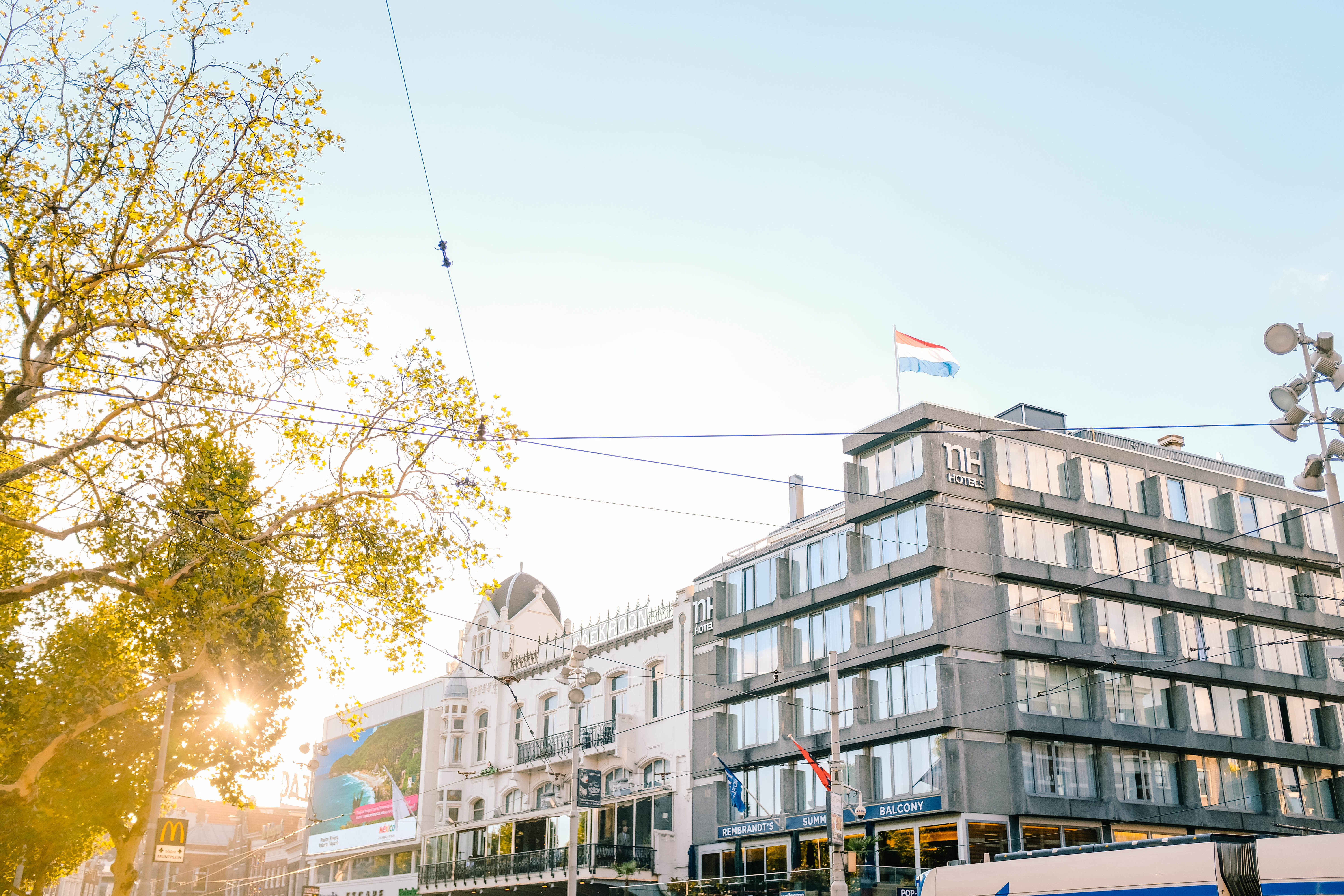 5K, sunlight, building exterior, lumiere, netherlands, day, flag, low angle view, nature, apartment, hotels, soleil, house, building, motor vehicle, clear sky, HD Wallpaper