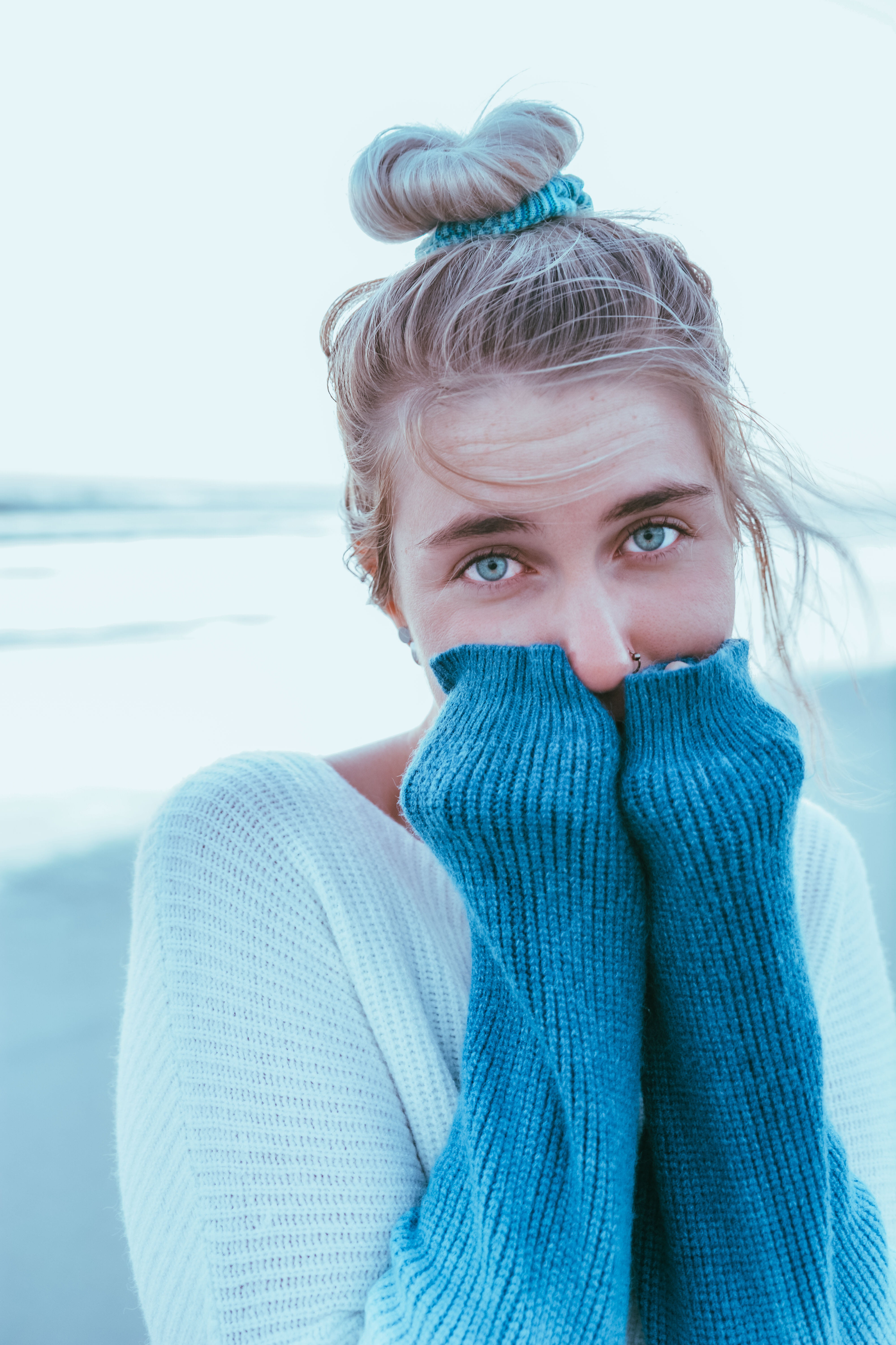 cardigan, covering, women, hair, sweatshirt, blond hair, face, beanie, adult, cap, human, sweater, hat, looking at camera, warm clothing, one person, fleece, Phone HD Wallpaper