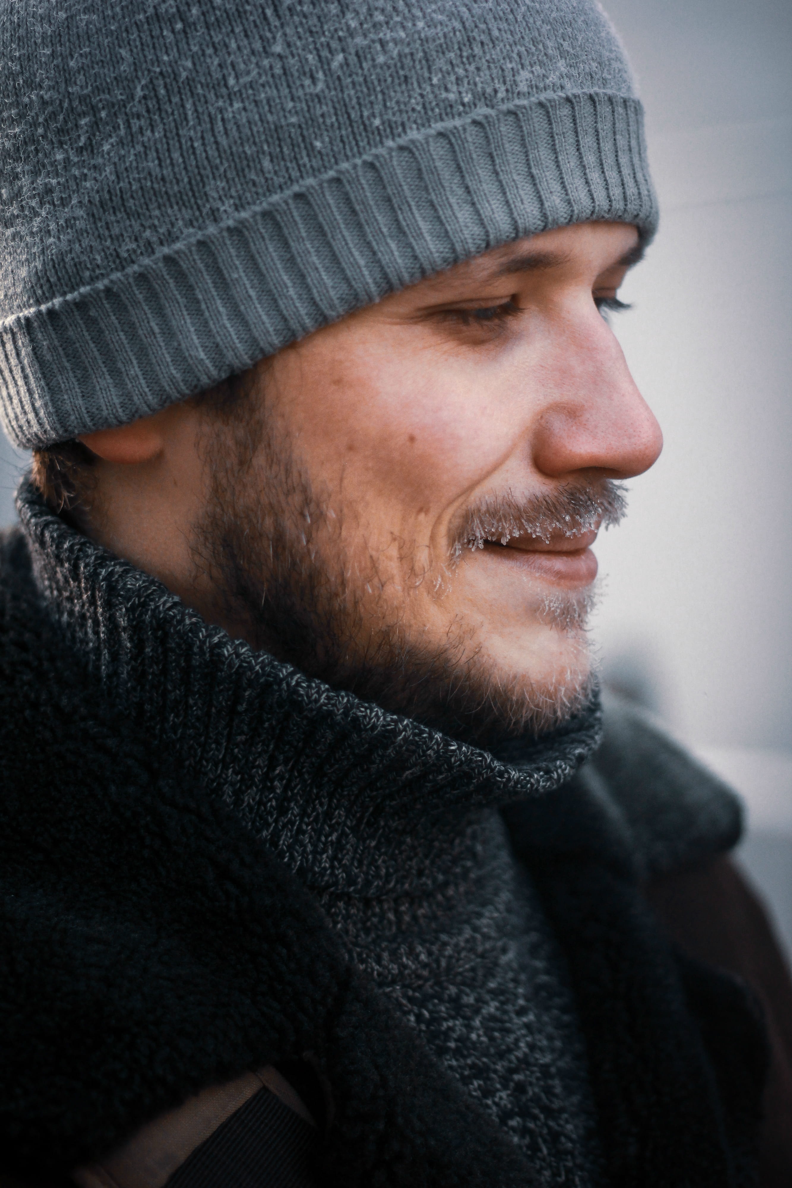 black, winter, gray, lifestyles, jacket, headshot, face, whistle, bonnet, wearing, beanie, one person, man, zipper, human, knit hat, person, cap, young adult, Phone HD Wallpaper