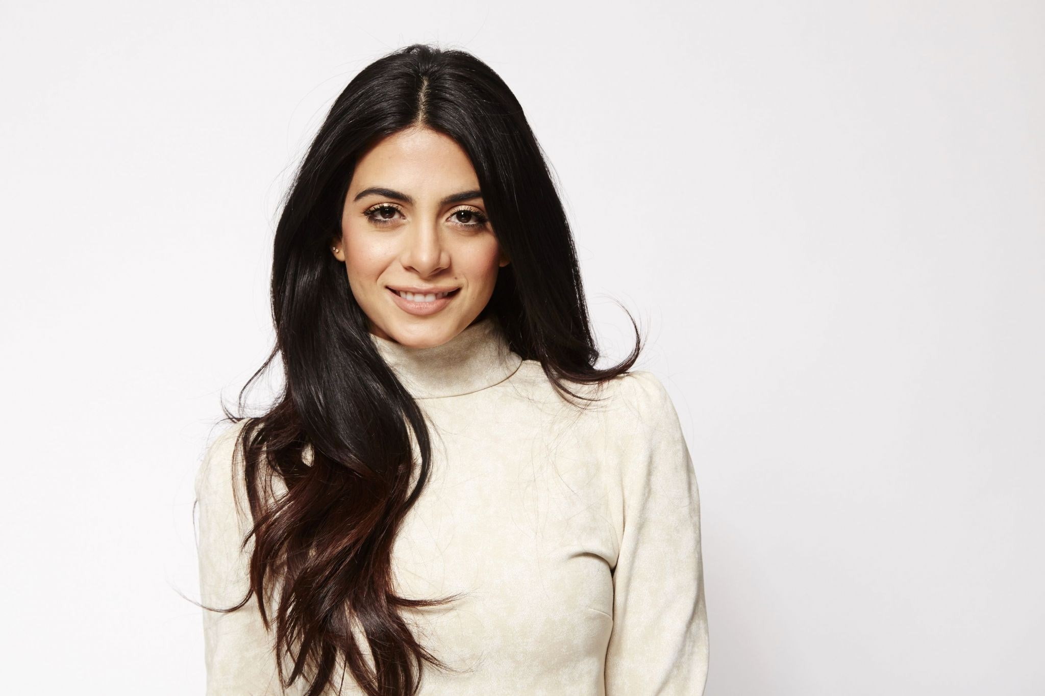 indoors, smiling, studio shot, casual clothing, white background, one person, black hair, actress, Emeraude Toubia, waist up, Canadian, women, young adult, HD Wallpaper