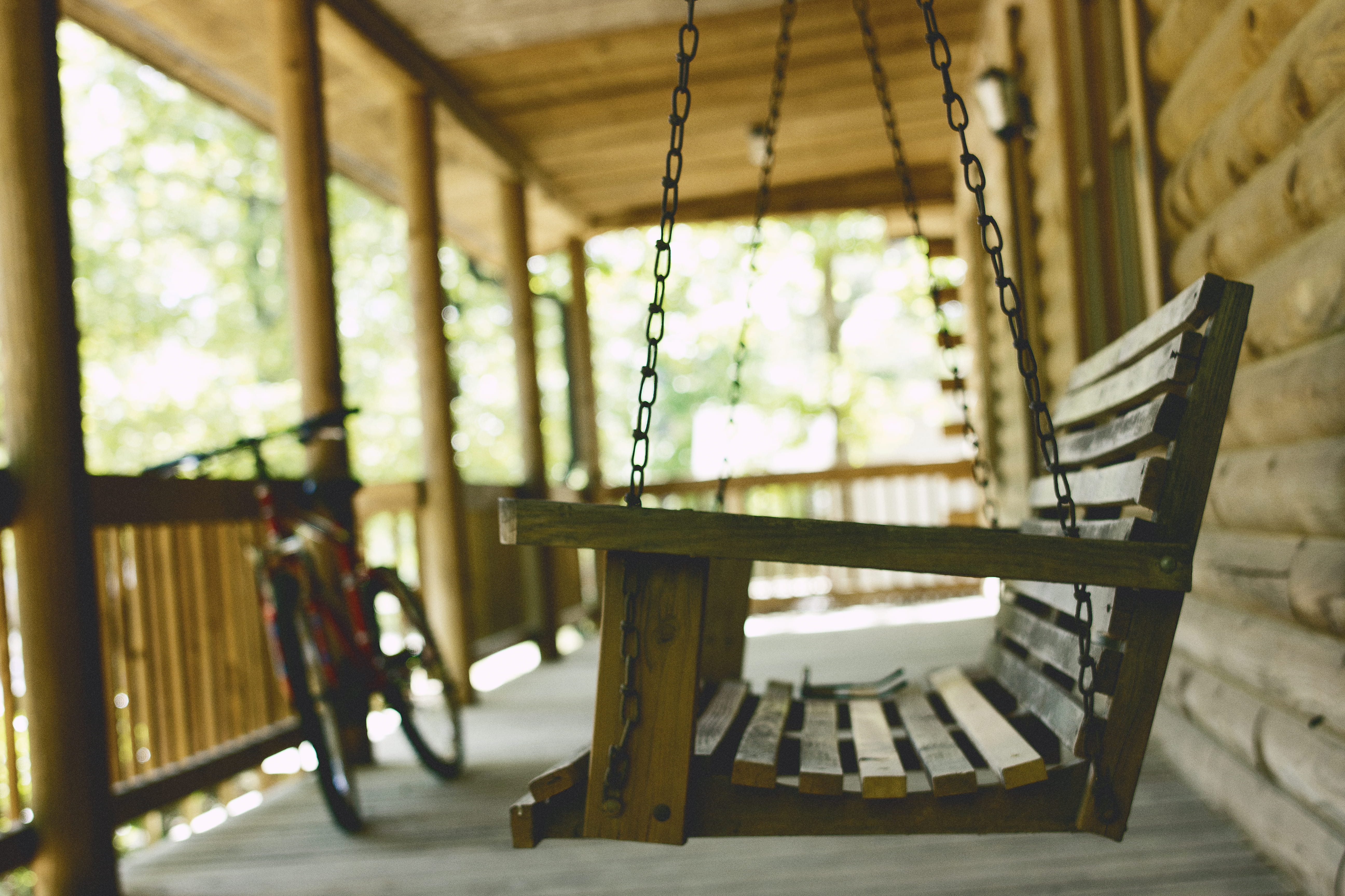 brown, swing, architecture, porch, near, absence, 5K, alone, domestic room, bike, yellow, indoors, relax, wood - material, flooring, sunlight, seat, nature, HD Wallpaper
