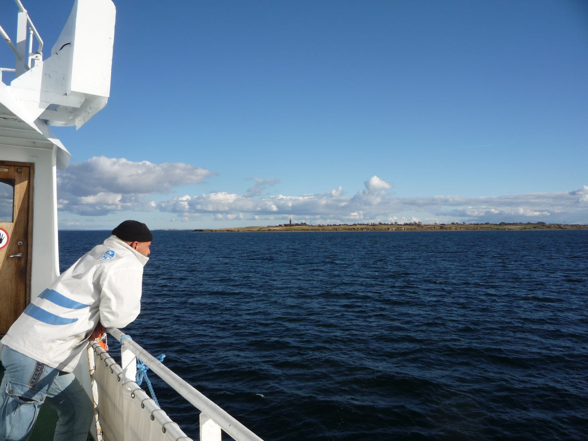 denmark, white, uniform, land, one person, autumn, one man only, rear view, Fishing Boat, only men, occupation, three quarter length, fur seal, sea, Boot, HD Wallpaper