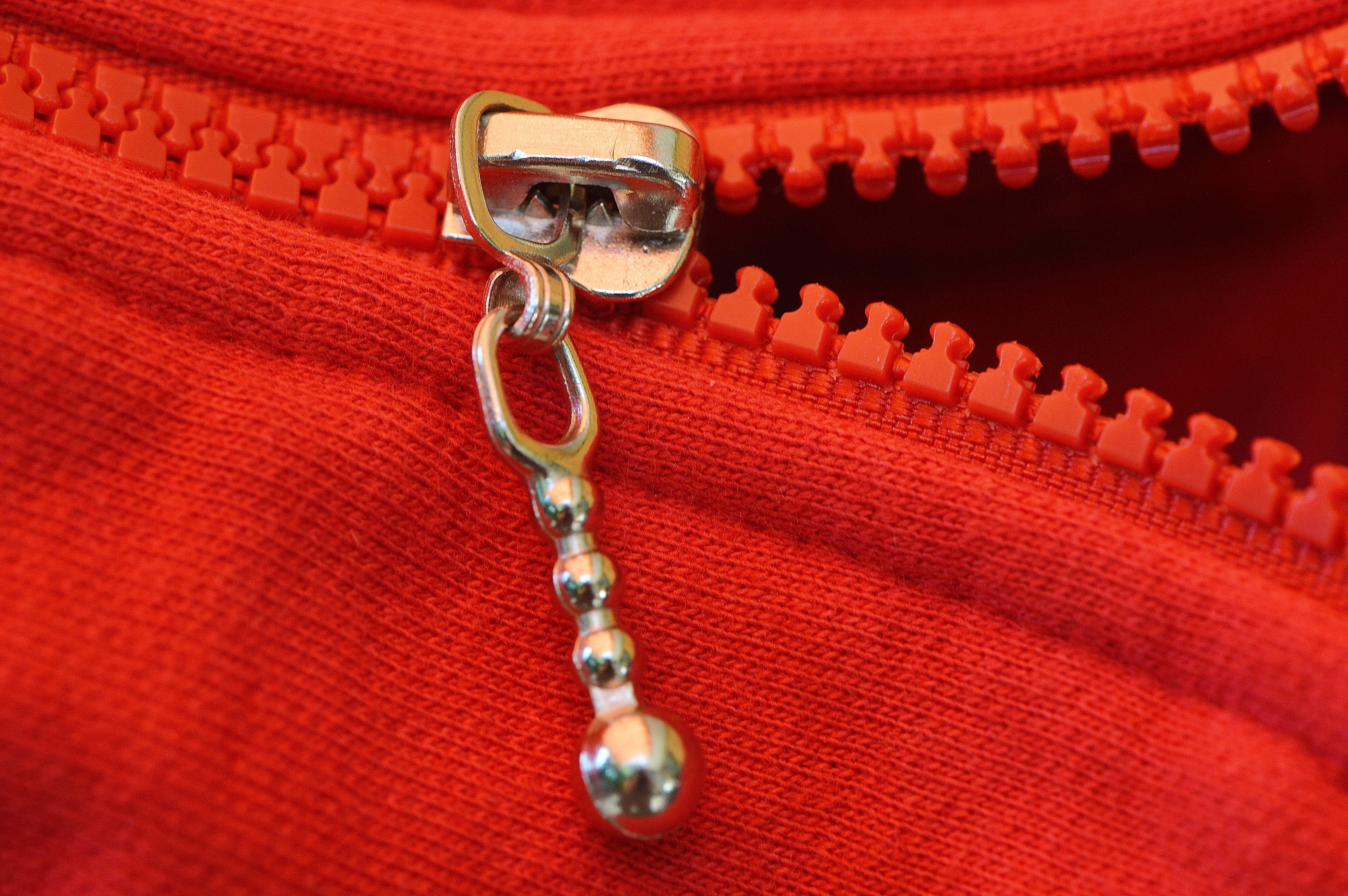 metal, red, jacket, wealth, sofa, necklace, furniture, zip, studio shot, no people, personal accessory, open, textile, fashion, chain, pearl jewelry, 5K, HD Wallpaper