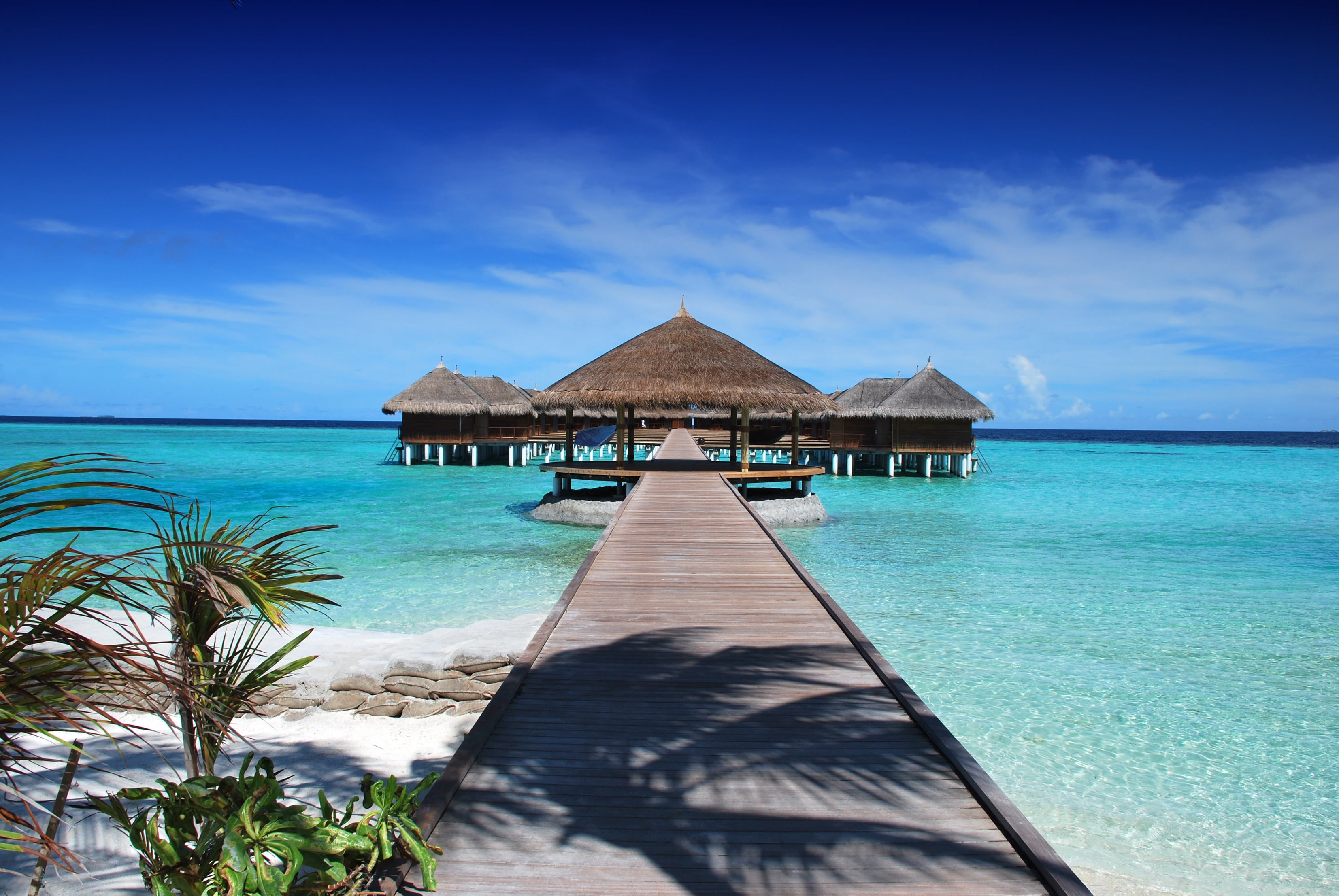 tranquility, maldives, hotel, roof, sand, water, trip, vacations, horizon over water, dock, turquoise colored, beauty in nature, thatched roof, blue, land, HD Wallpaper