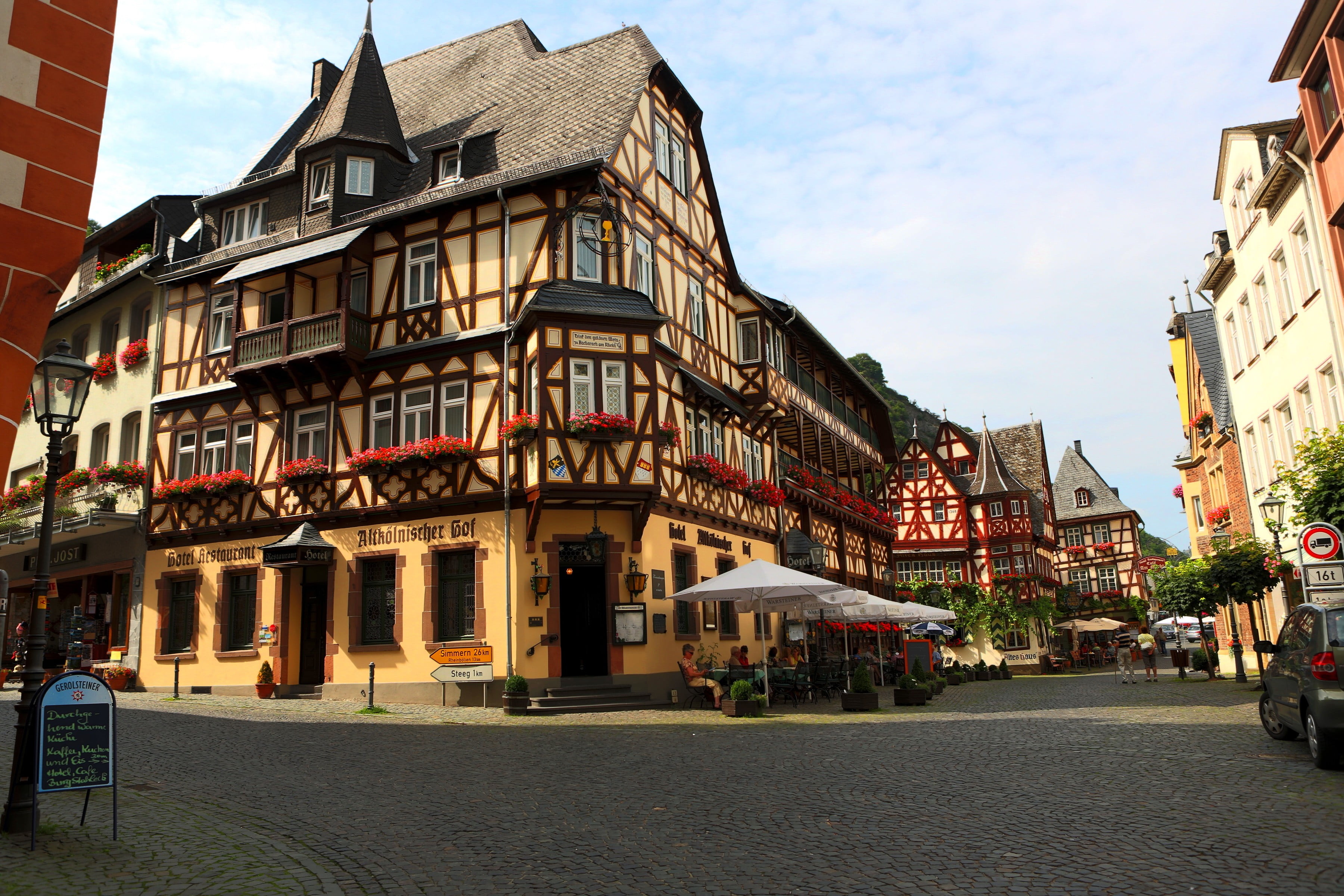 the way forward, outdoors, villages, incidental people, day, building exterior, direction, Germany, architecture, patio, city, town, transportation, cloud - sky, HD Wallpaper
