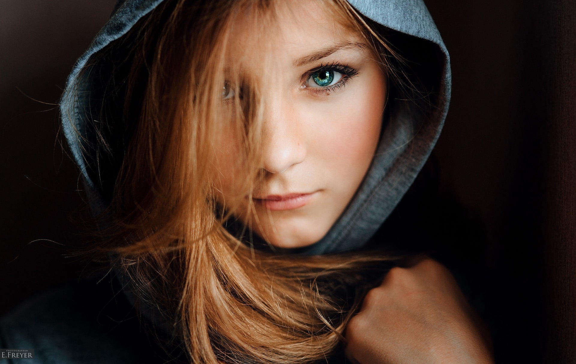hairstyle, close-up, eyes, Evgeny Freyer, one person, brown hair, hoods, contemplation, headshot, black background, portrait, women, hood - clothing, blonde, HD Wallpaper