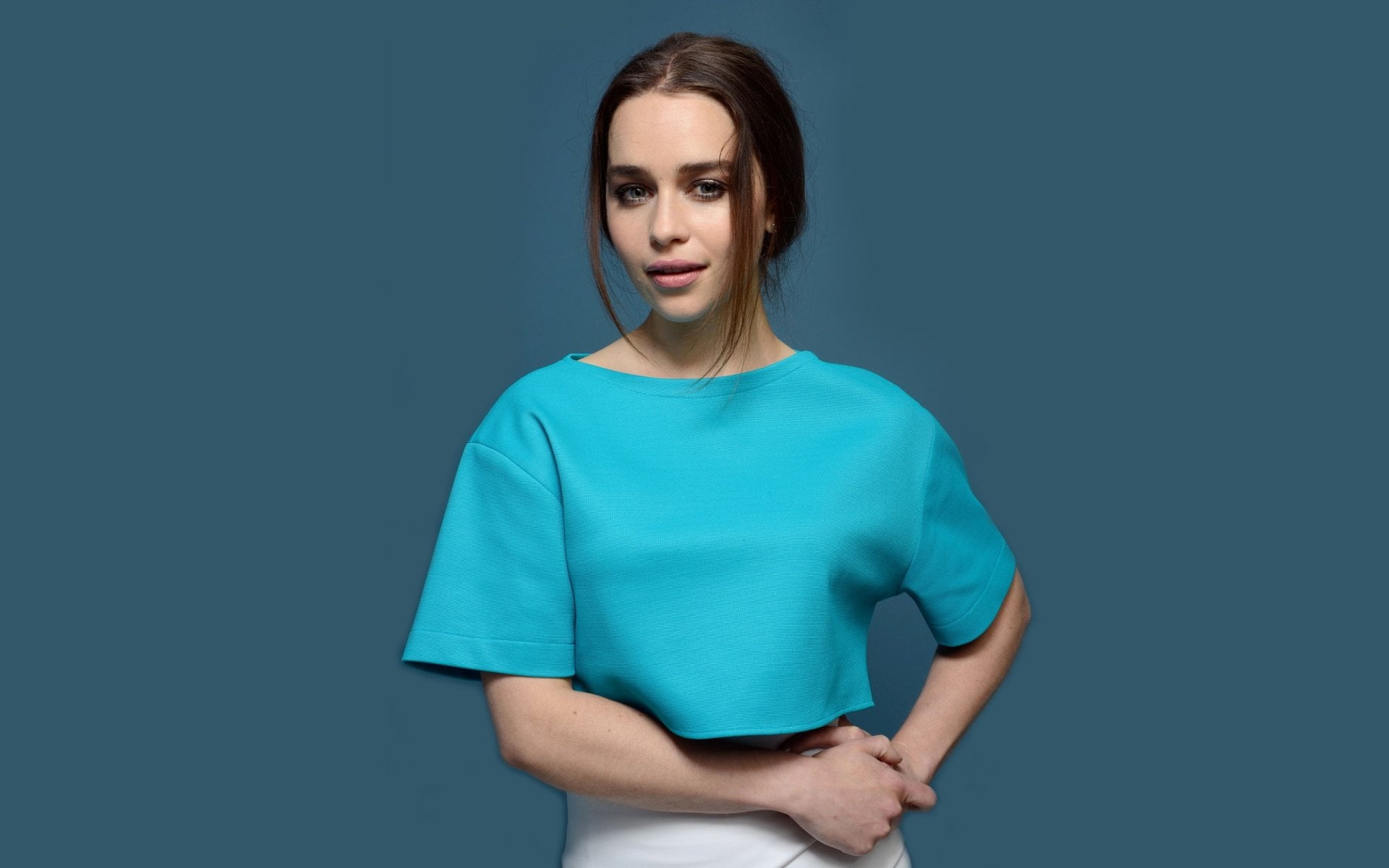 beautiful woman, indoors, women, sadness, irritation, adult, standing, blue background, waist up, studio shot, young adult, front view, t-shirt, emotion, HD Wallpaper