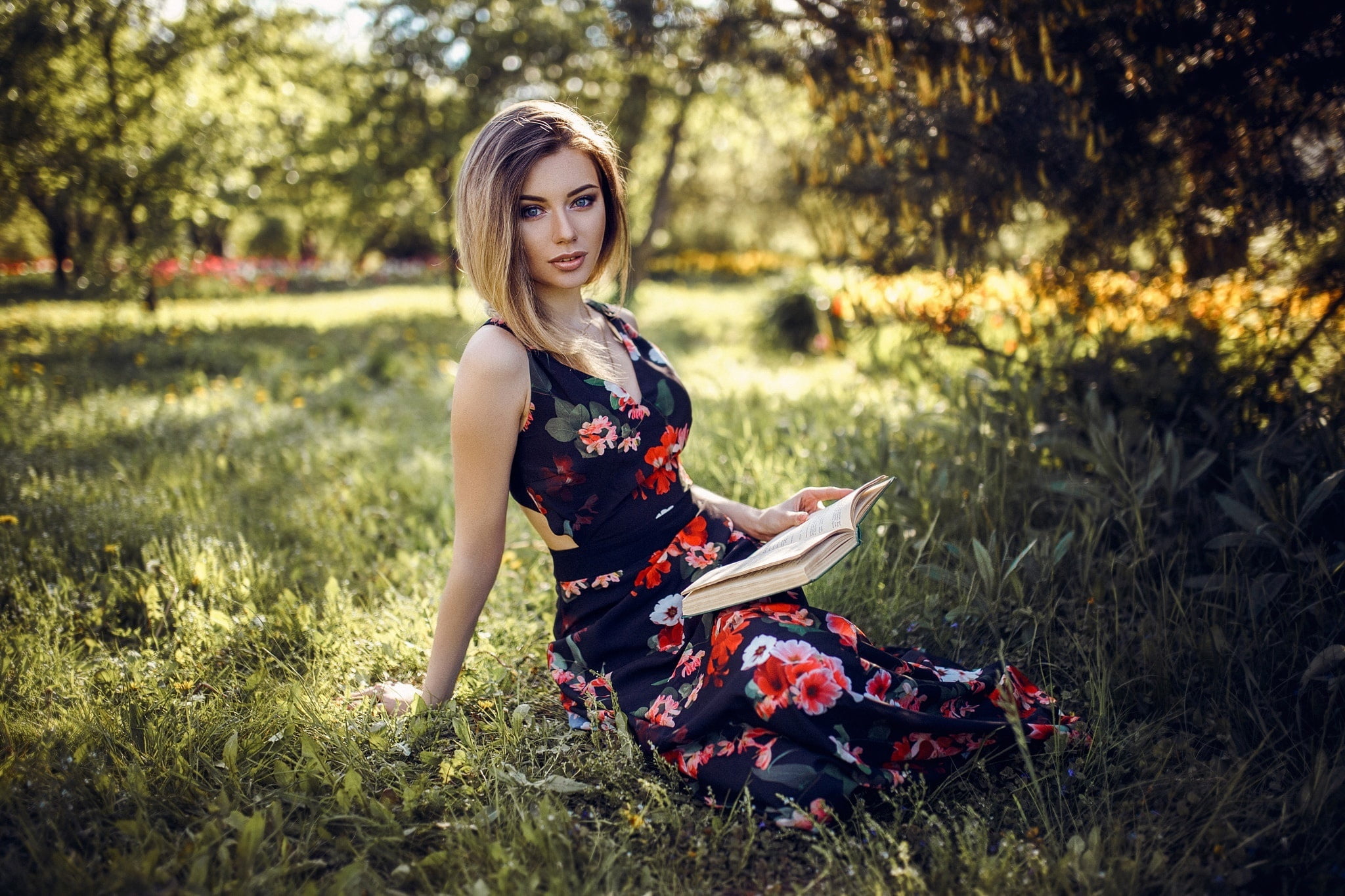the sun, bokeh, Hakan Erenler, on the grass, look, model, sitting, blonde, pose, greens, hairstyle, beauty, portrait, Daria, nature, book, dress, 1080P, HD Wallpaper