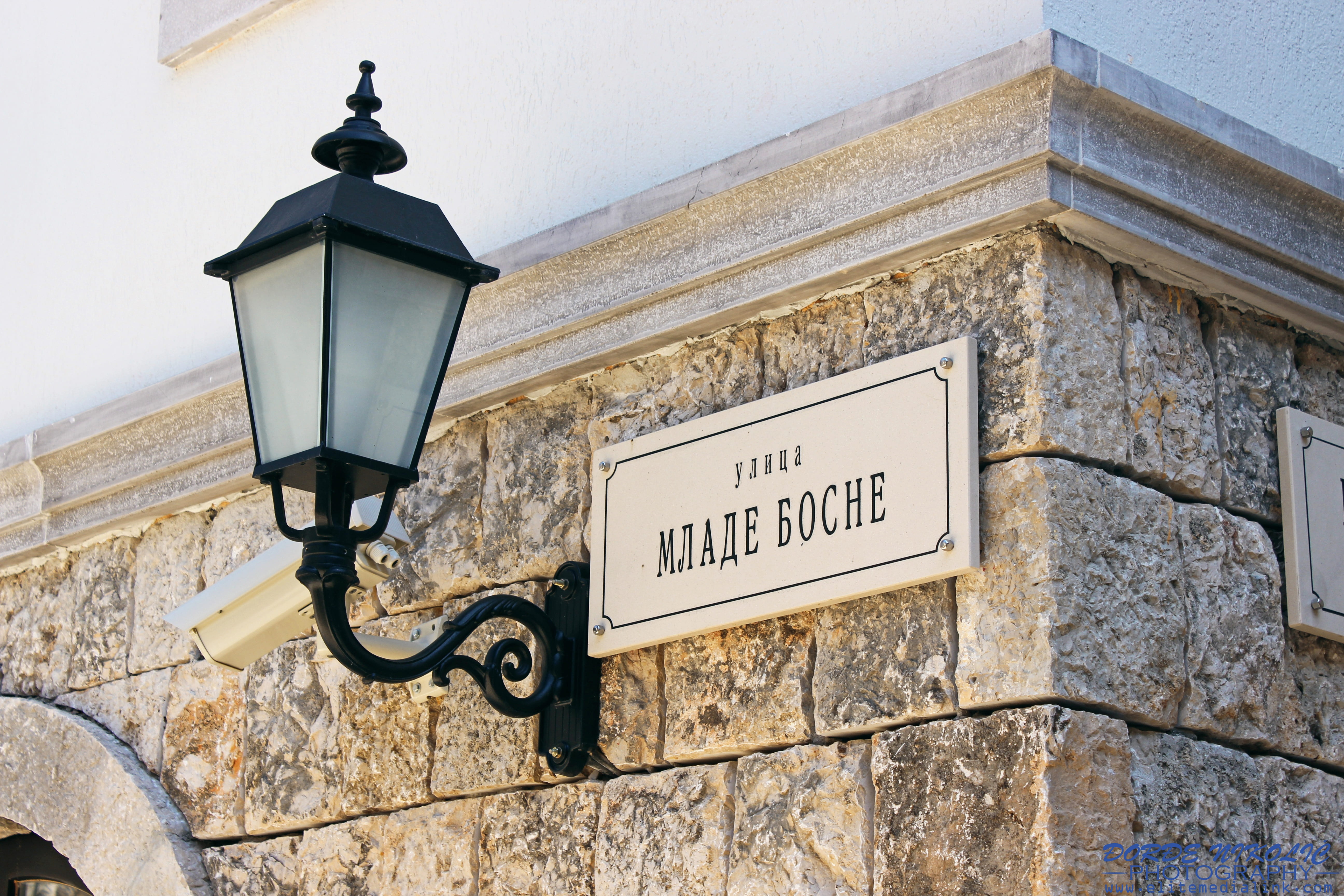 western script, day, europe, white, stone wall, street, no people, andricgrad, electric lamp, mlada bosna, old, visegrad, night, sign, vintage, text, wall - building feature, HD Wallpaper