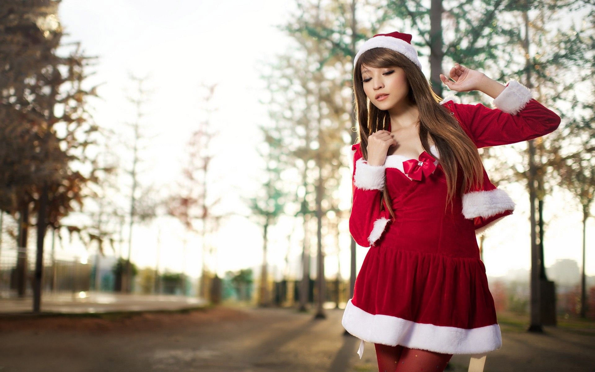 long hair, girls, women, limb, one person, Agnes Lim, tree, brown hair, hair, red, young adult, outdoors, beautiful woman, nature, arms raised, Santa costume, HD Wallpaper