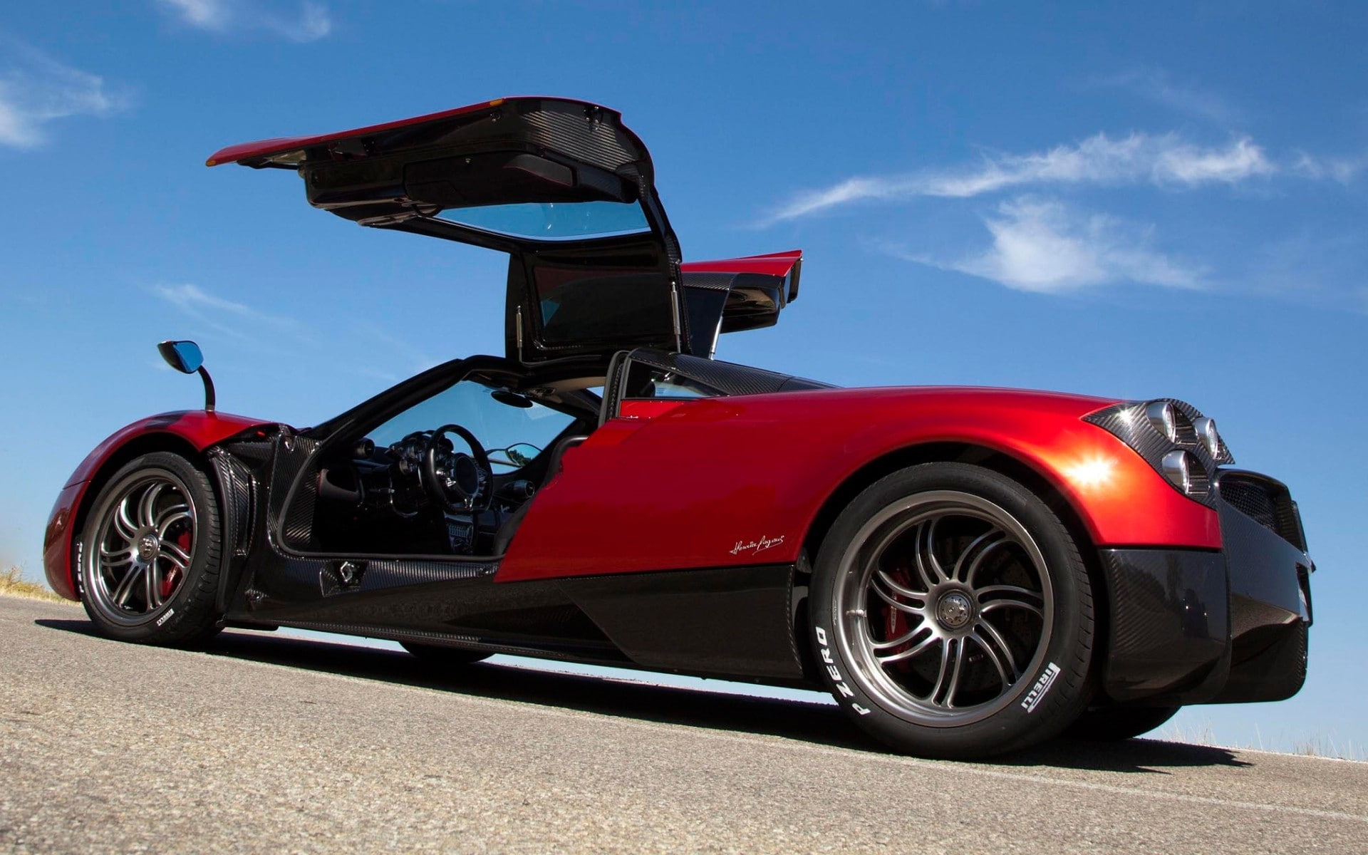 motor vehicle, land vehicle, low angle view, Pagani Huayra, sports race, transportation, sky, nature, cloud - sky, motorsport, wheel, Pagani, driving, tire, HD Wallpaper