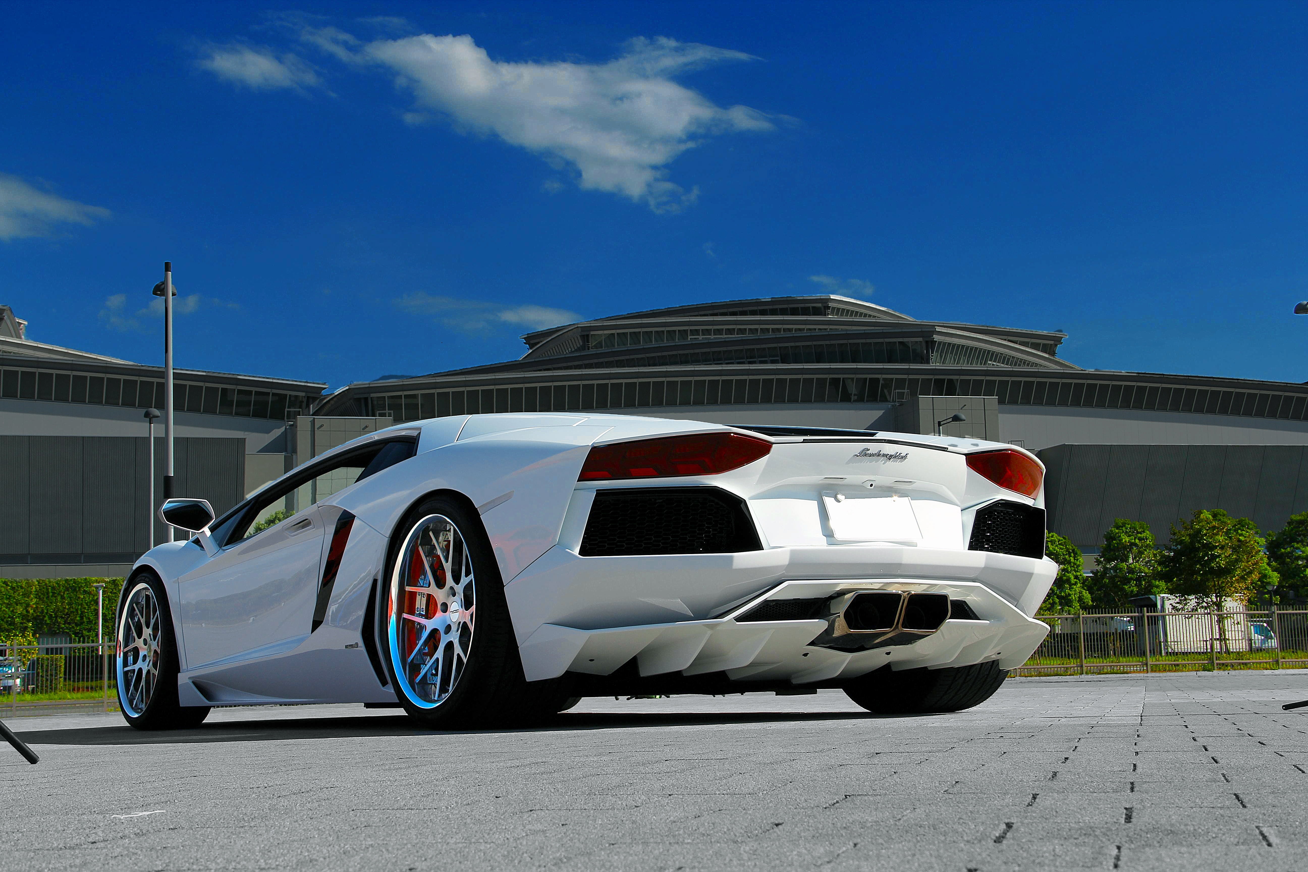 clouds, nature, sports Venue, cloud - sky, sport, mode of transportation, aventador, technology, day, coupe, wheel, transportation, business, stationary, HD Wallpaper