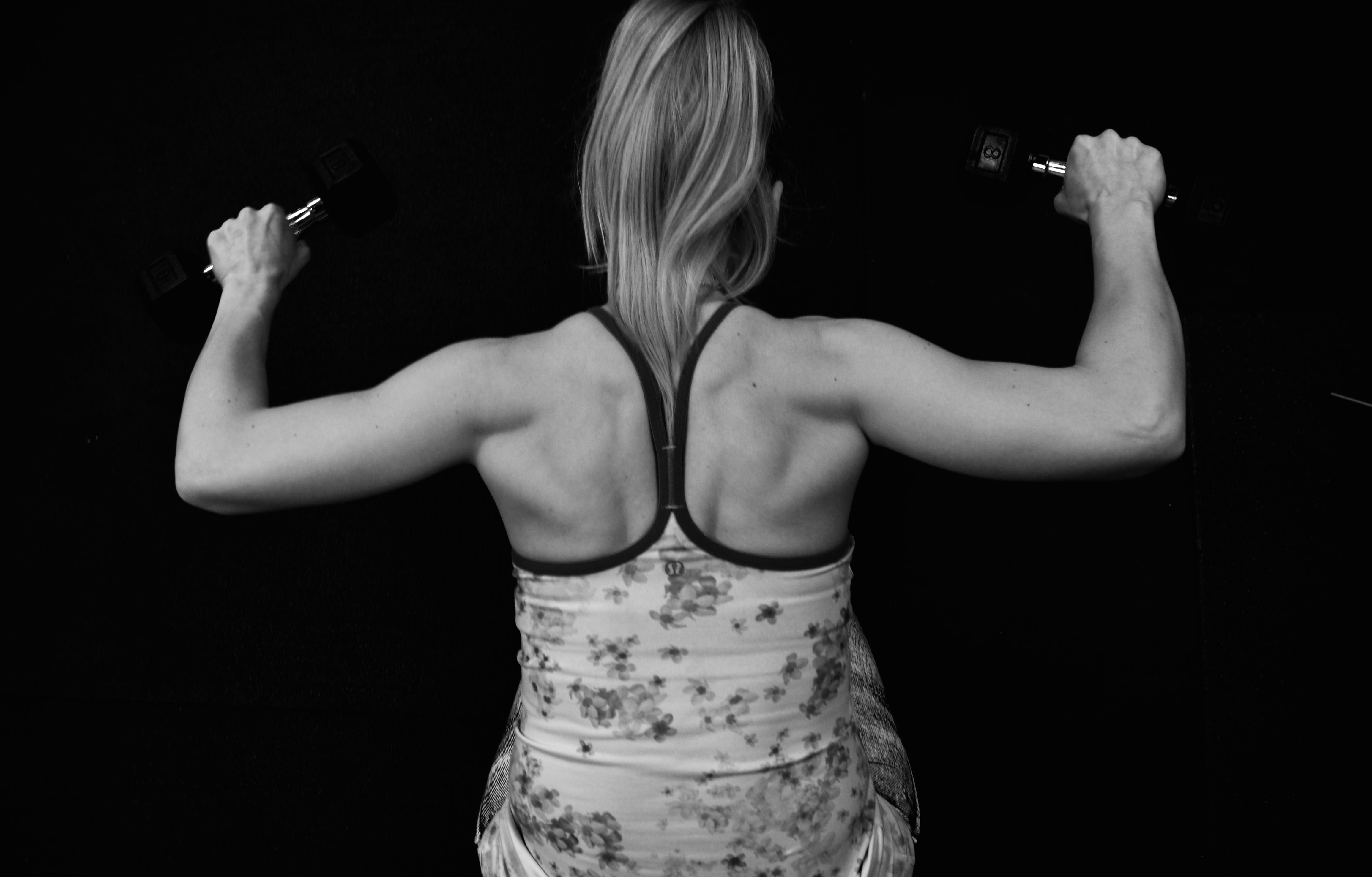 vaughan, bicep, hair, strength, human arm, body part, 4K, human body part, blond hair, arms raised, hairstyle, limb, black background, women, barbell, HD Wallpaper