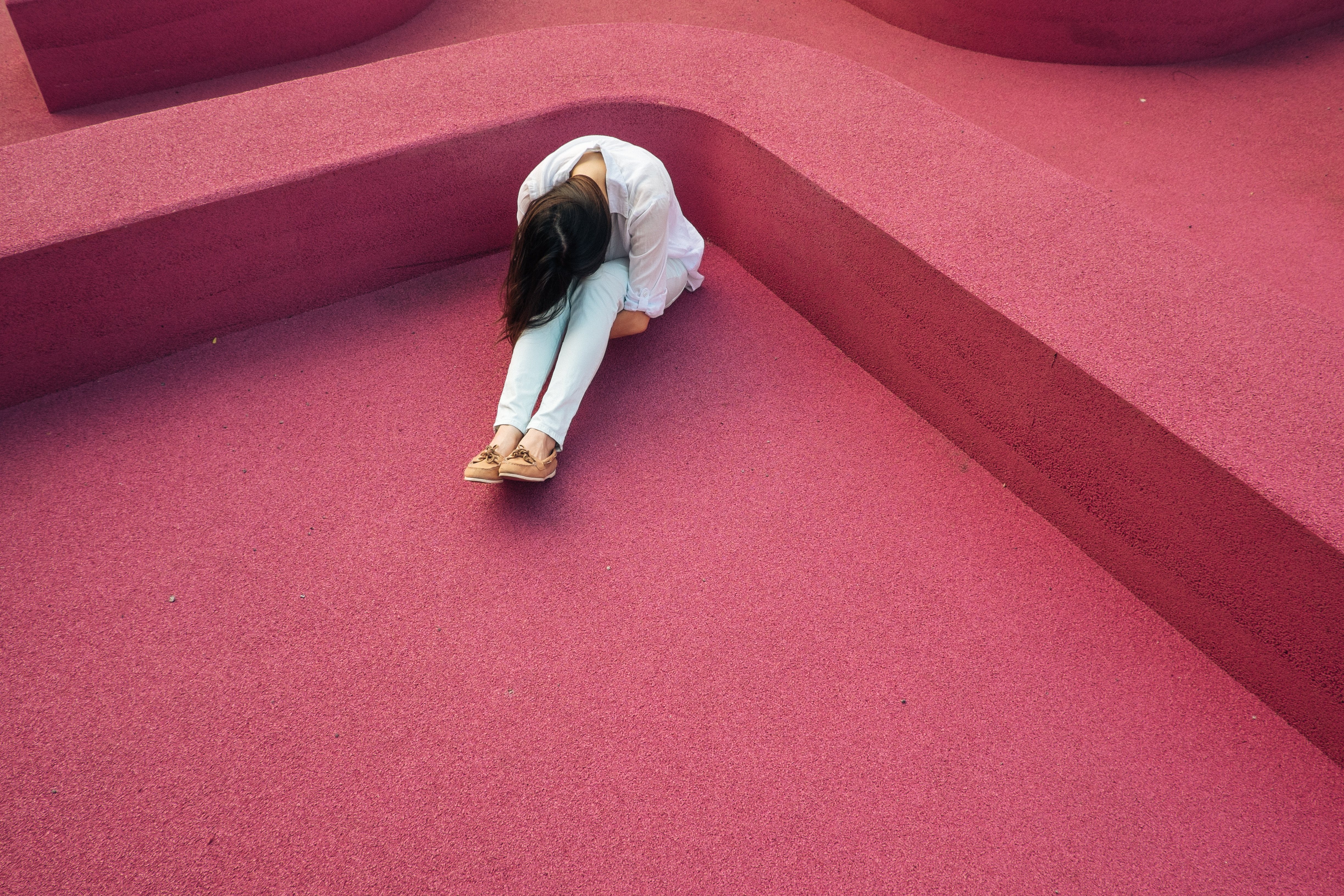 high angle view, adult, full length, sitting, girl, women, depression - sadness, outdoors, hairstyle, people, real people, indoors, private, pink color, HD Wallpaper