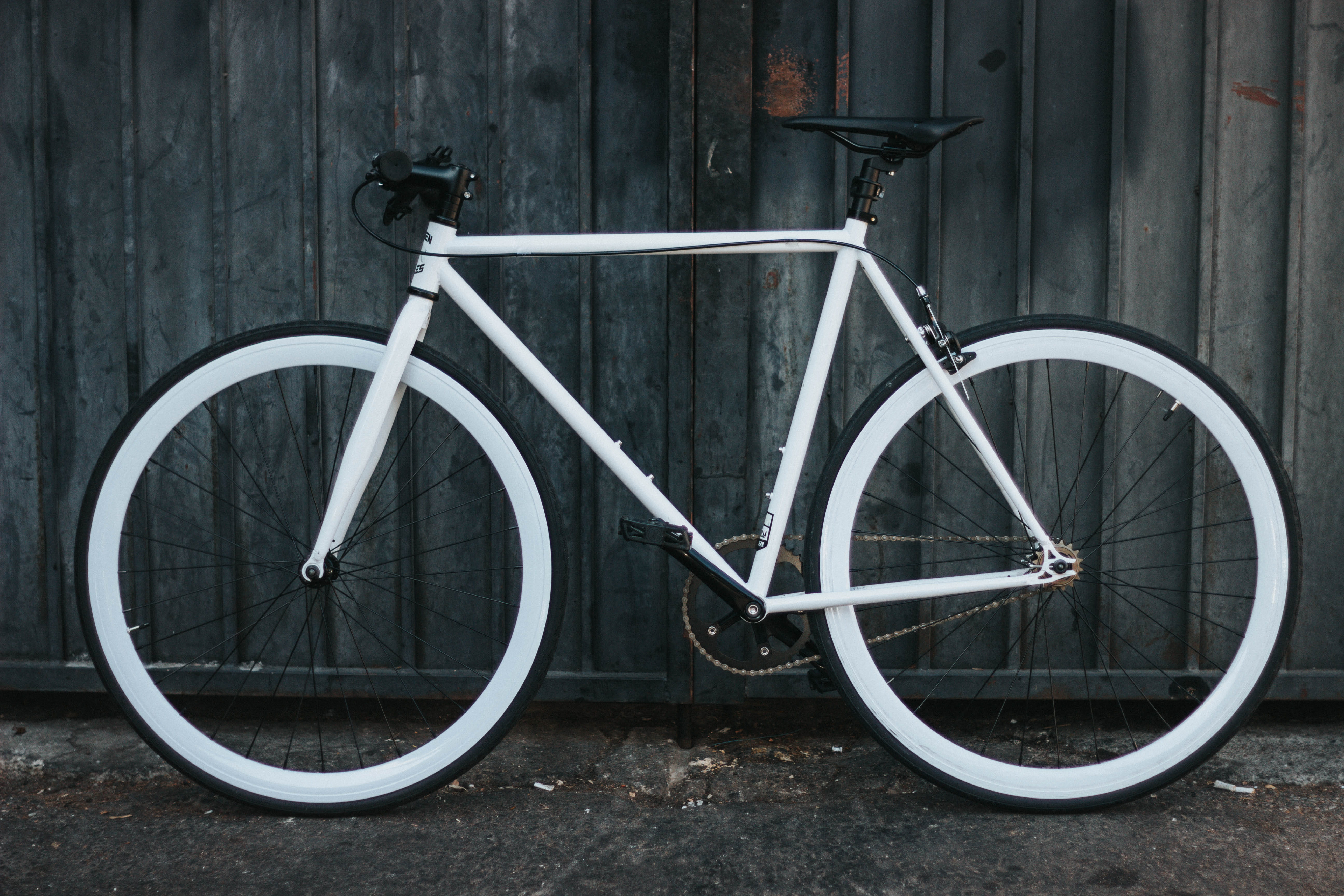 day, building, mode of transportation, transportation, single object, bike, tire, panel, bar, beside, city, stationary, no people, street, built structure, HD Wallpaper