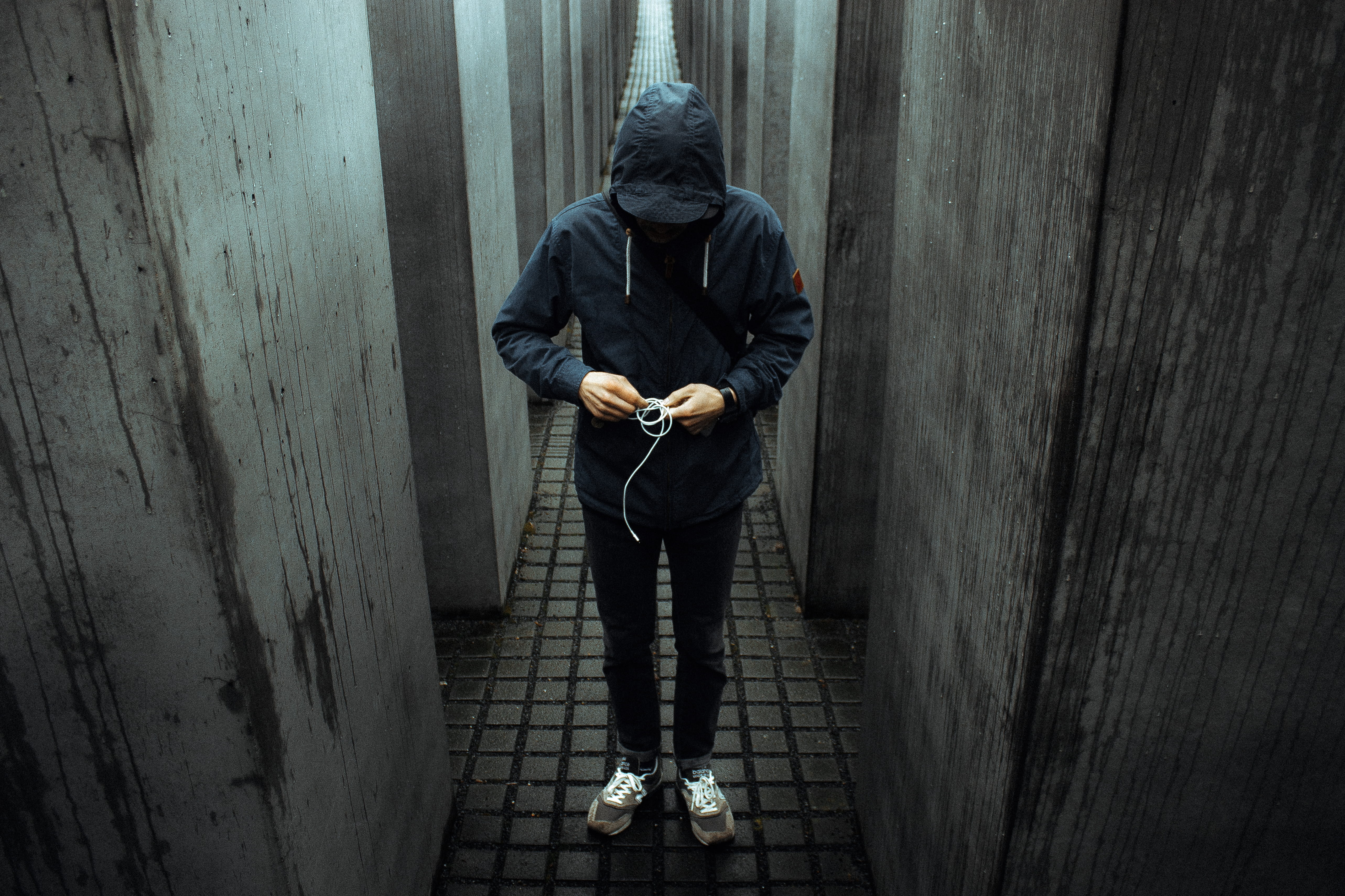 jacket, leisure activity, crime, wall - building feature, pullover, dark, hoodie, person, people, one Person, outdoors, man, only men, holding, loneliness, HD Wallpaper