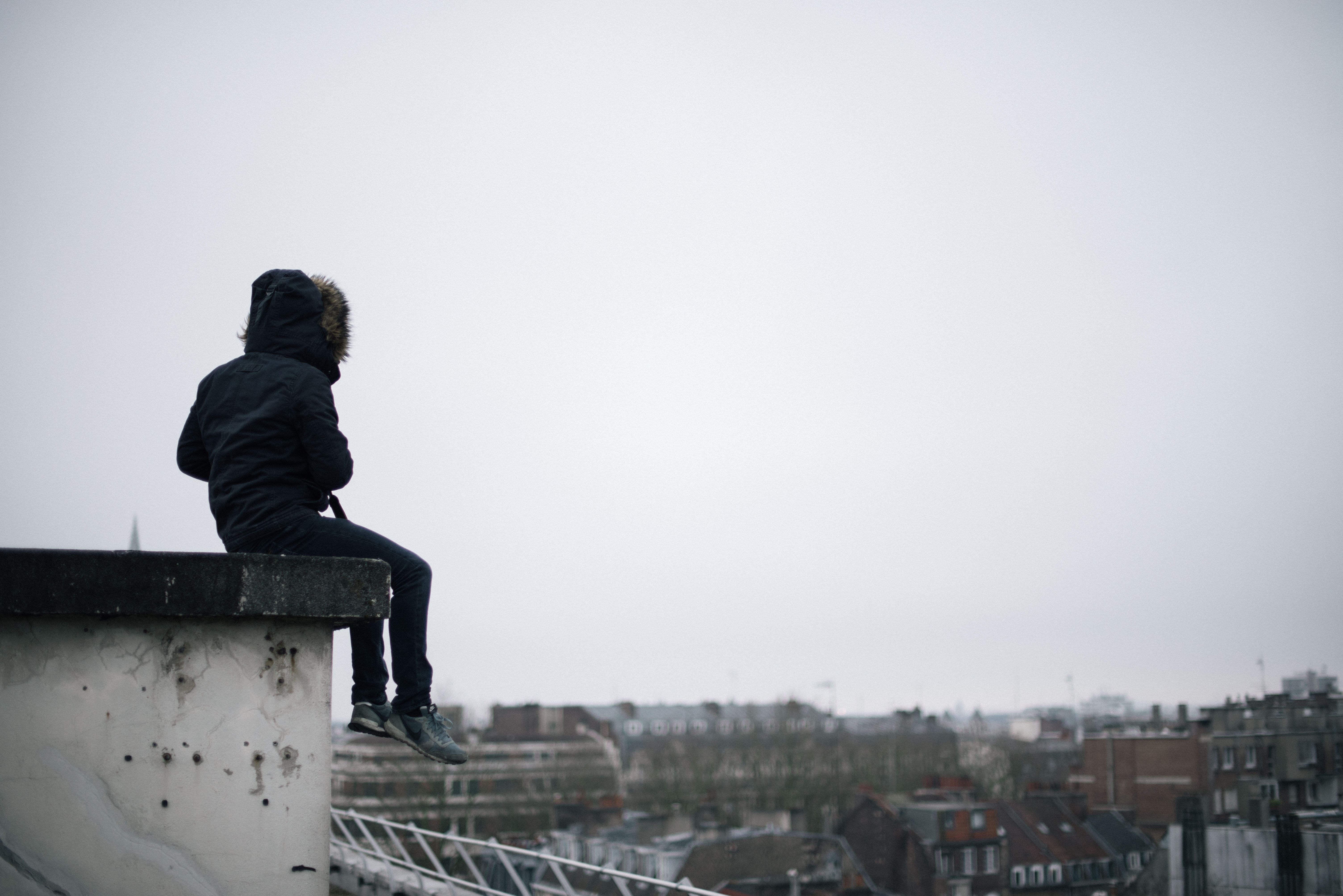 lifestyles, real people, looking at view, sadness, city, built structure, sky, day, women, females, solitude, urban Scene, freedom, man, adult, hooded, HD Wallpaper