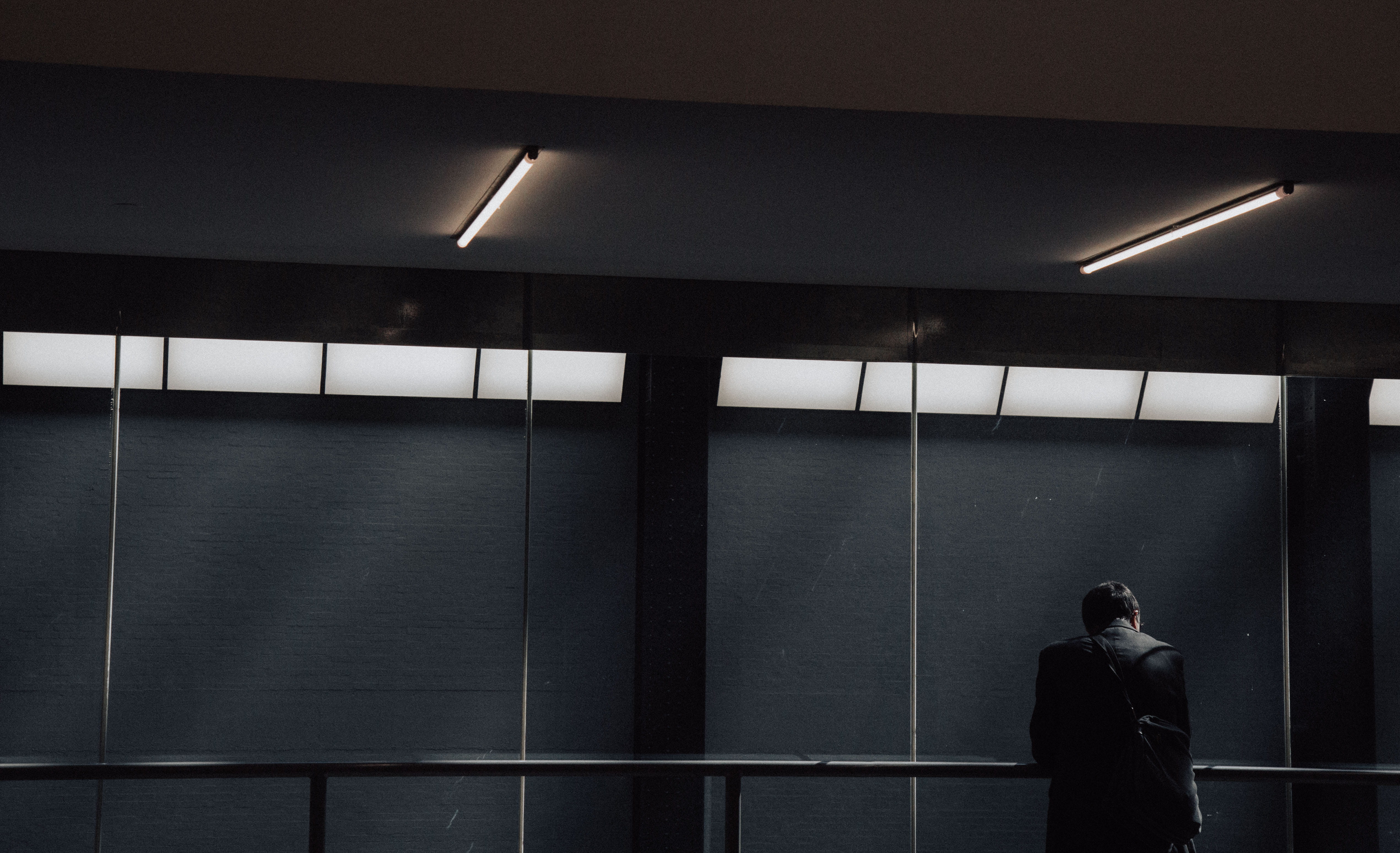 steel, mature adult, contemplation, lighting equipment, rail, dust, black and white, architecture, person, alone, illuminated, depression - sadness, city, HD Wallpaper