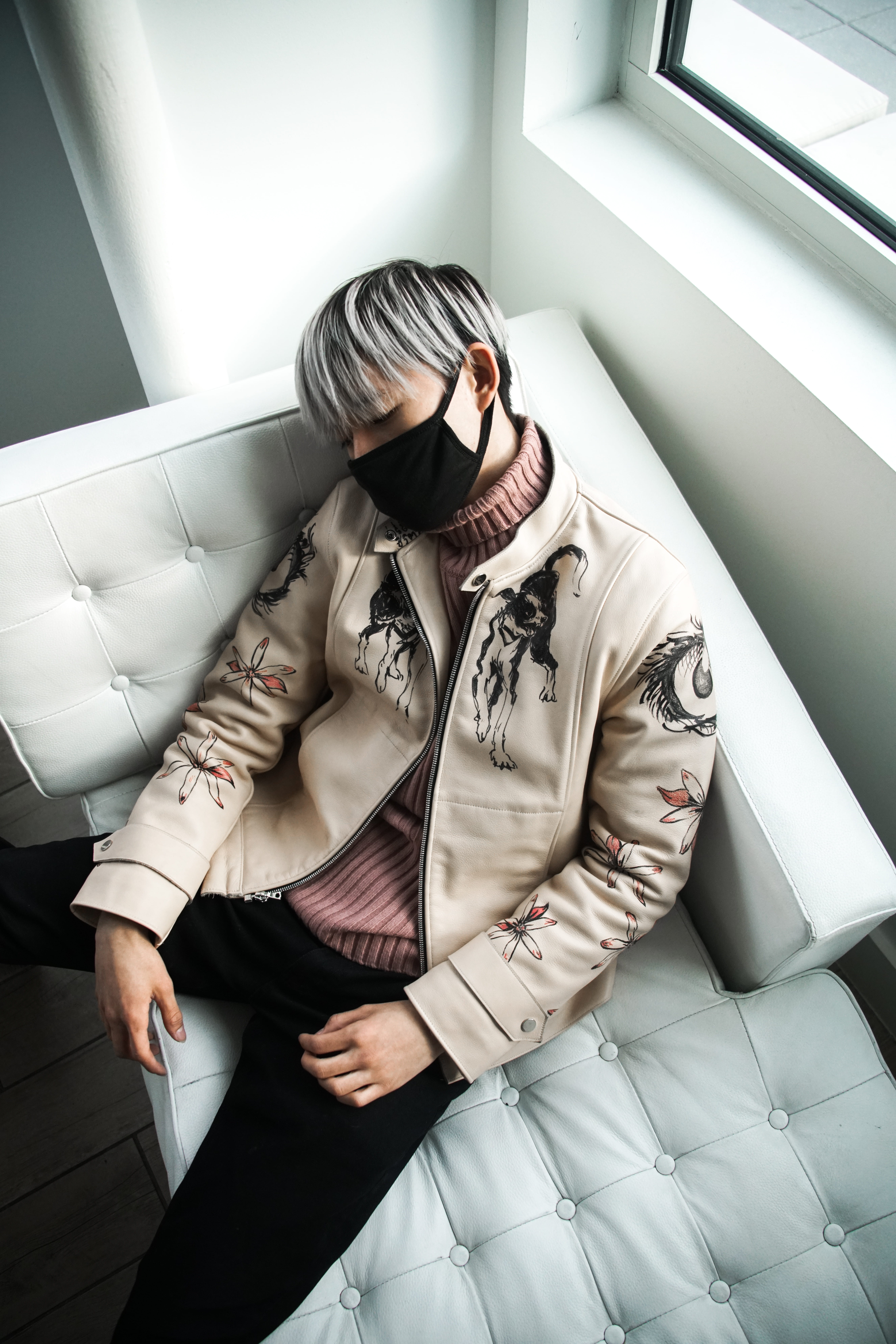 sofa, leather jacket, standing, lounge, boy, person, widow light, man, fashion, turtleneck, front view, 8K, adult, indoor, leather, lying, tufted, mask, Phone HD Wallpaper