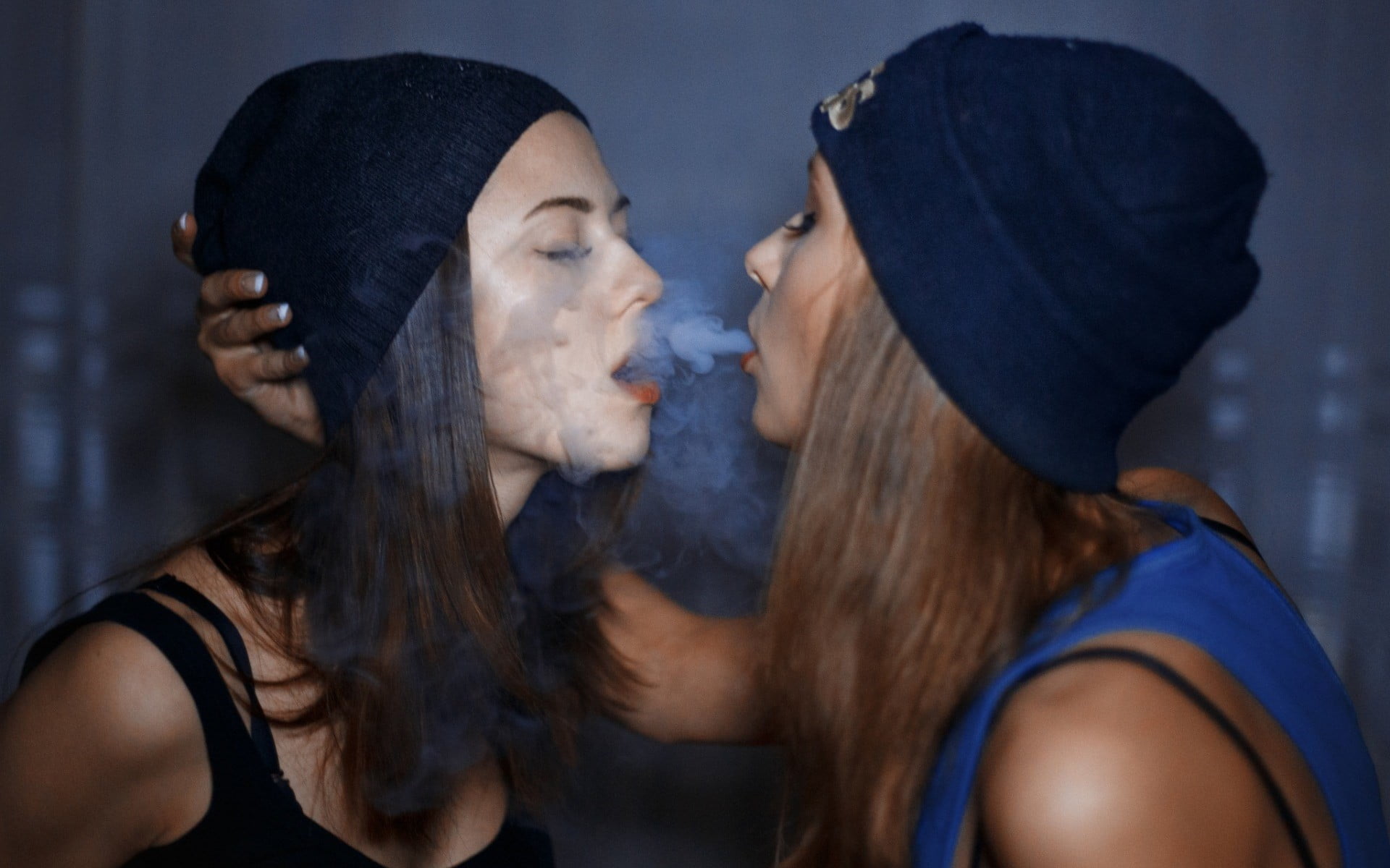 smoking, caps, emotion, young women, indoors, beautiful woman, smoke, hood - clothing, face to face, 1080P, headshot, hat, people, adult, knit, closed eyes, HD Wallpaper