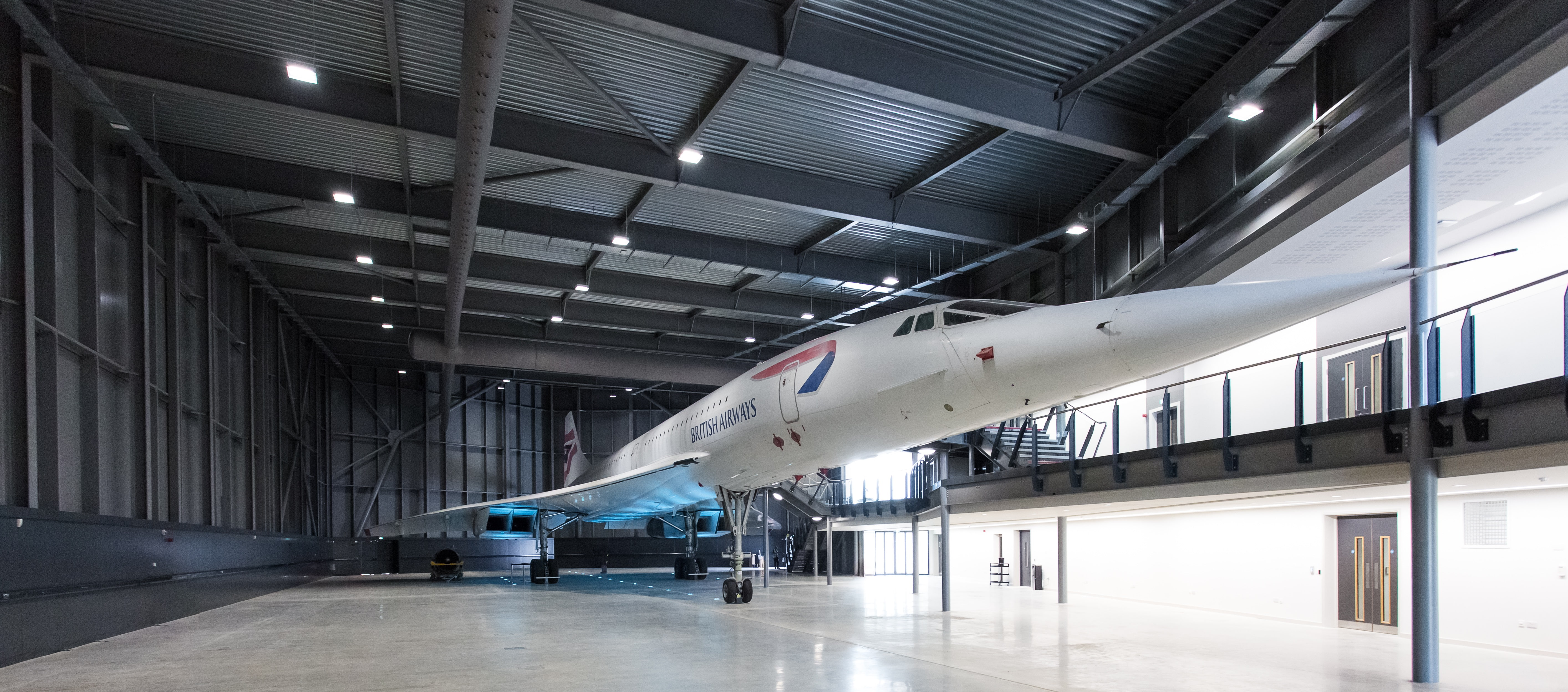 airplane, modern, 5K, absence, airport, built structure, aerospace industry, architecture, Concorde, technology, building, travel, airplane hangar, no people, HD Wallpaper