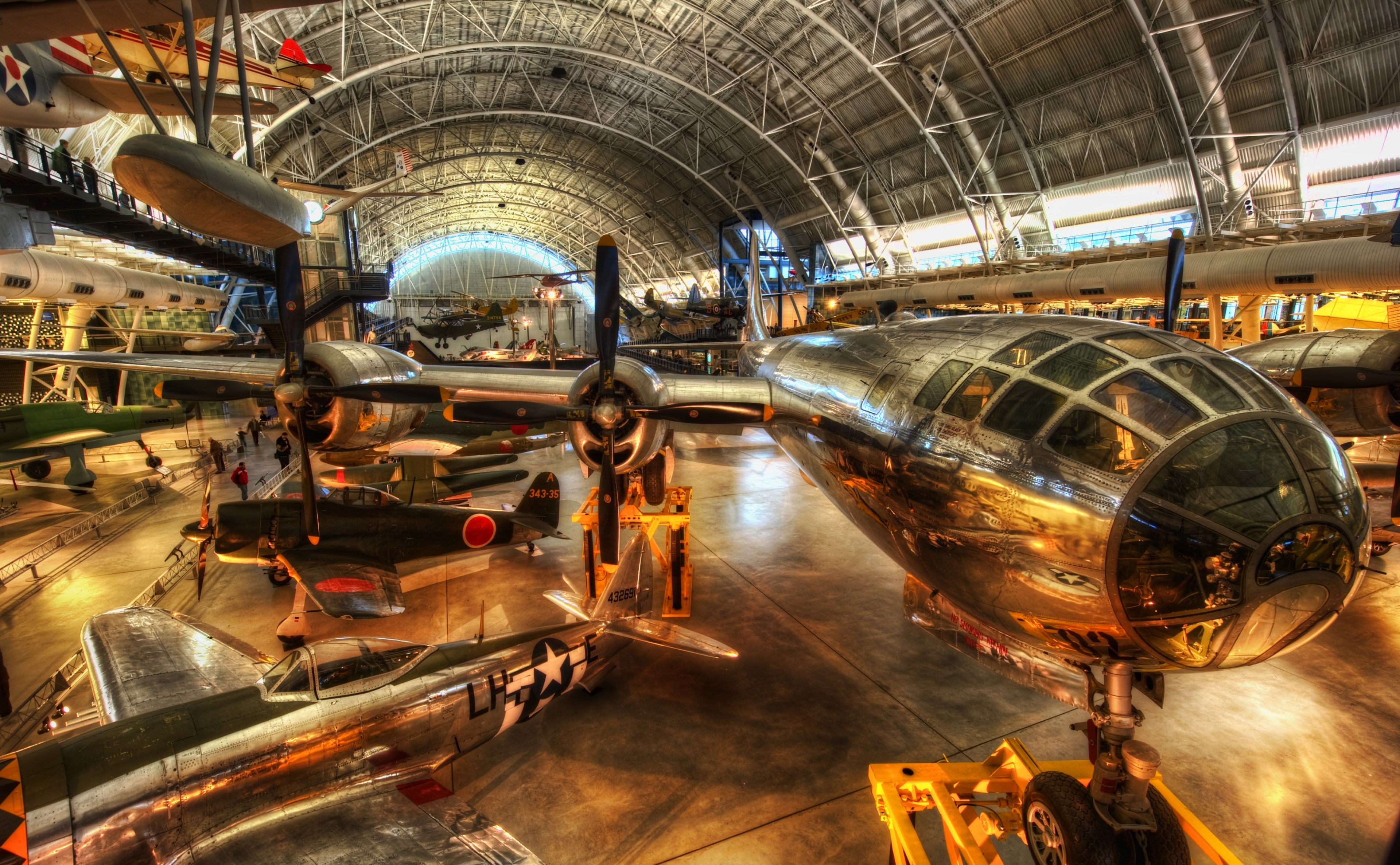 illuminated, mode of transportation, Airplane, Enola Gay, indoors, grey, high angle view, industrial equipment, flooring, day, manufacturing, hangar, production line, HD Wallpaper