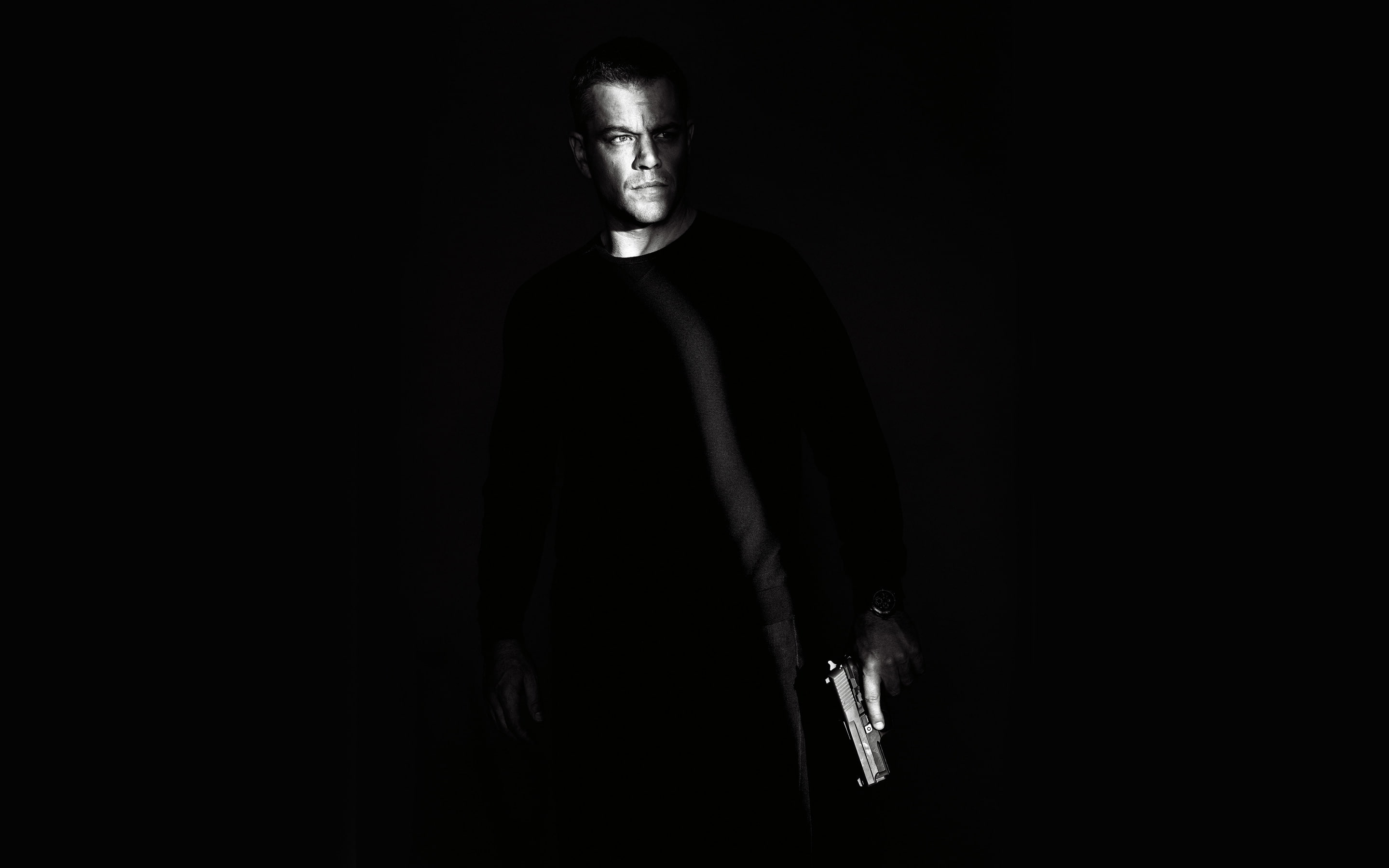 emotion, looking at camera, Bourne, studio shot, weapon, young adult, Matt, Damon, 2K, mystery, front view, dark, celebration, disguise, spooky, Jason, HD Wallpaper