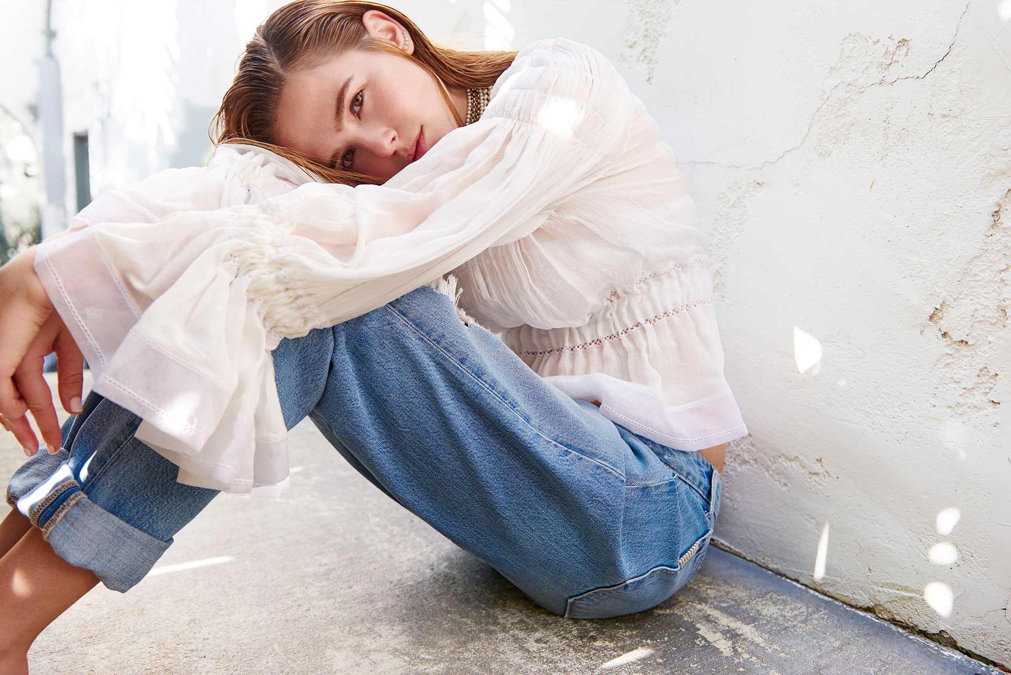 photographer, on the floor, actress, Flaunt, jeans, blouse, look, 1080P, Frederic Auerbach, the wall, model, Zoey Deutch, sitting, brown hair, HD Wallpaper