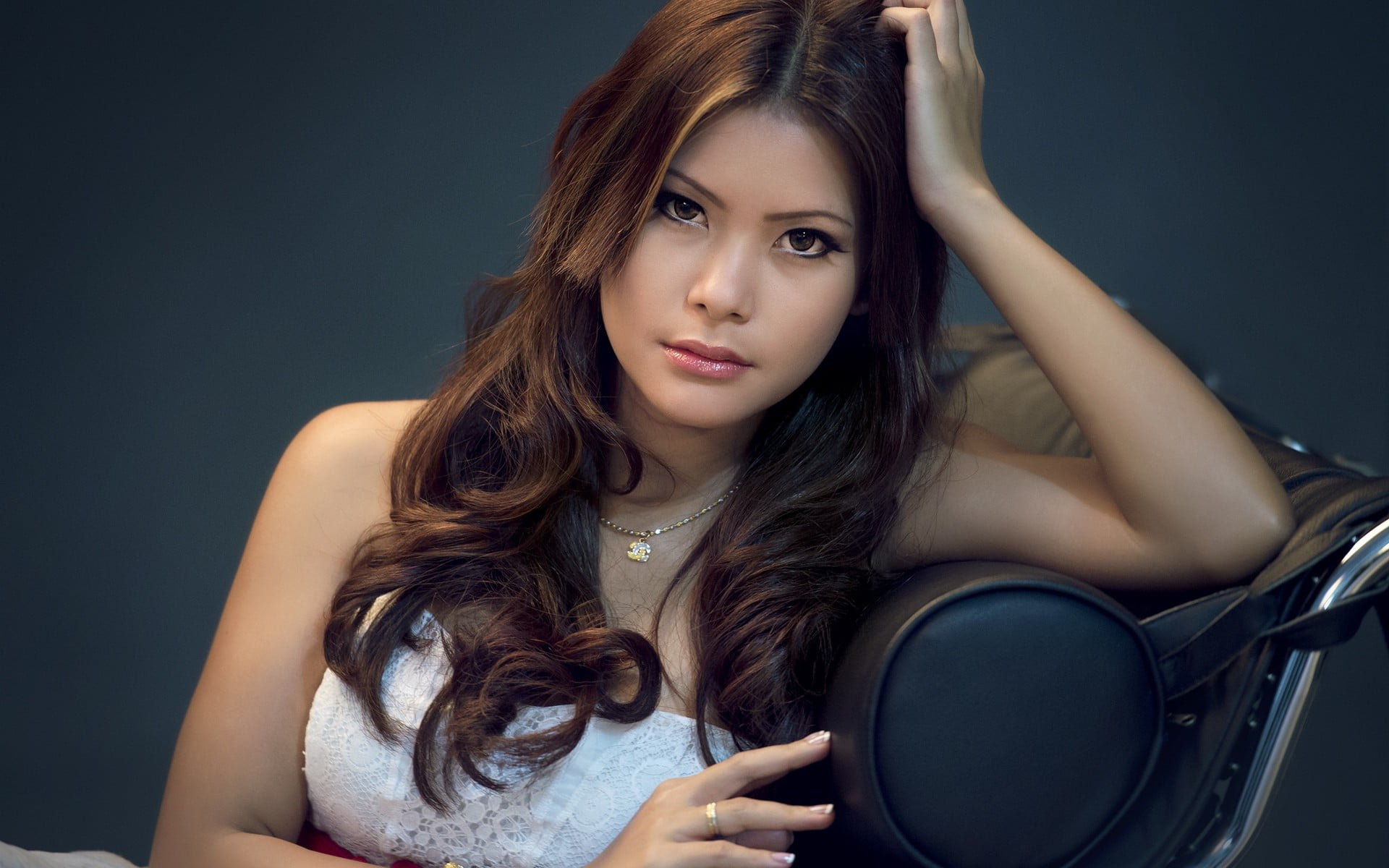 leisure activity, necklace, brown eyes, adult, women, beauty, bare shoulders, hands in hair, young women, 1080P, chair, front view, beautiful woman, young adult, HD Wallpaper