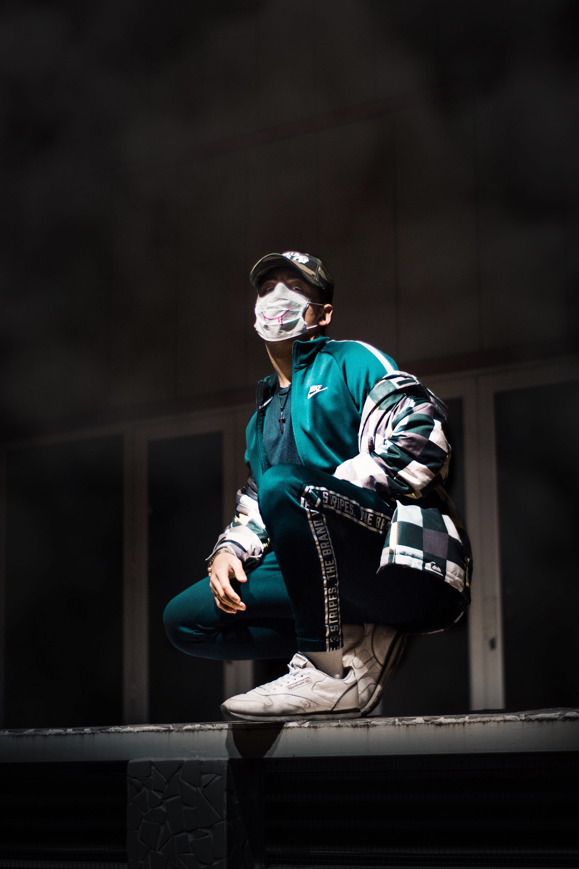 man, wall, clothing, front view, leisure activity, face mask, surface, young adult, young women, jacket, adult, mask, 2K, portrait, architecture, full length, Phone HD Wallpaper