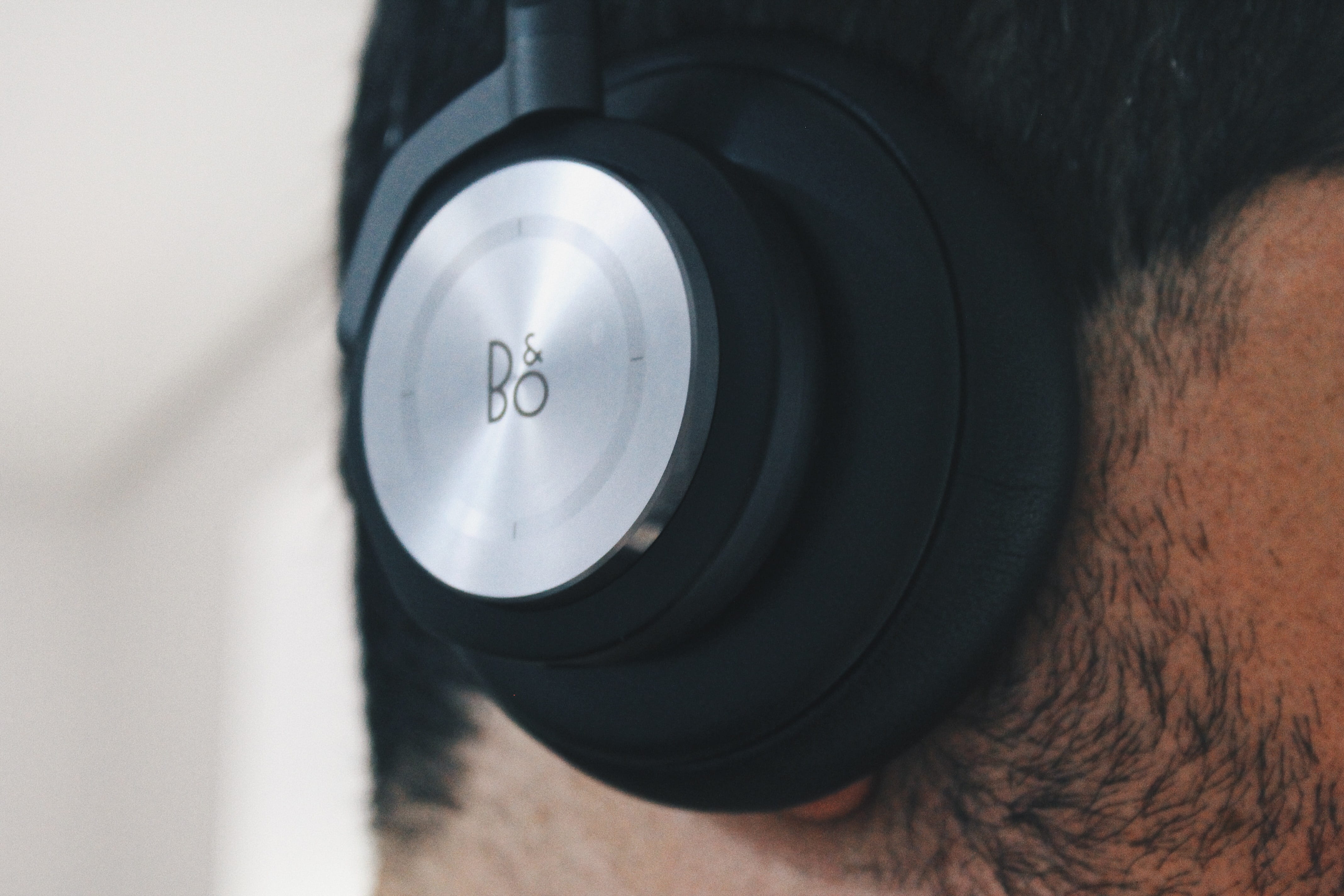 one person, focus on foreground, geometric shape, human body part, beoplay h7, audio, spain, shape, digital camera, beo, camera, space grey, sound, calle de blasco de garay, HD Wallpaper
