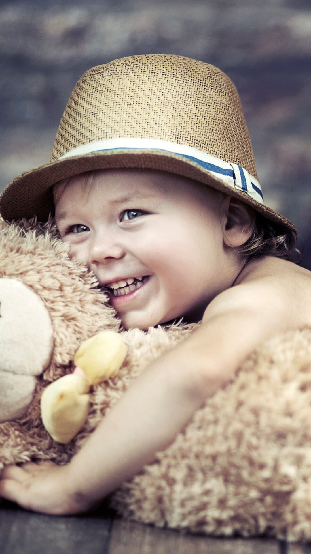 one person, happiness, smiling, smiley, brown, portrait, offspring, childhood, hat, cheerful, smiley face, teddy, warm clothing, winter, Baby, bear, s, Phone HD Wallpaper