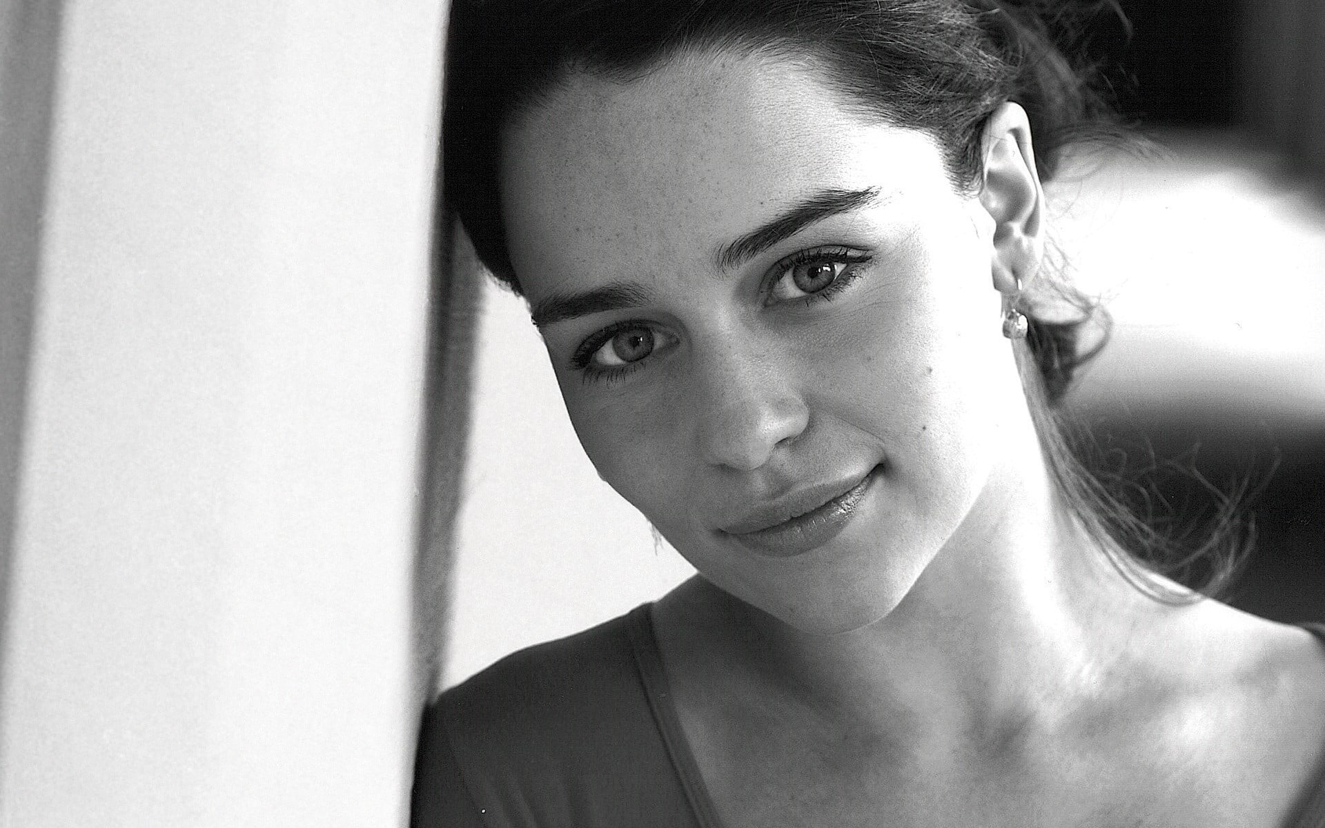 one person, adult, beauty, emotion, front view, Emilia Clarke, lifestyles, indoors, real people, young adult, 1080P, hairstyle, monochrome, smiling, leisure activity, HD Wallpaper