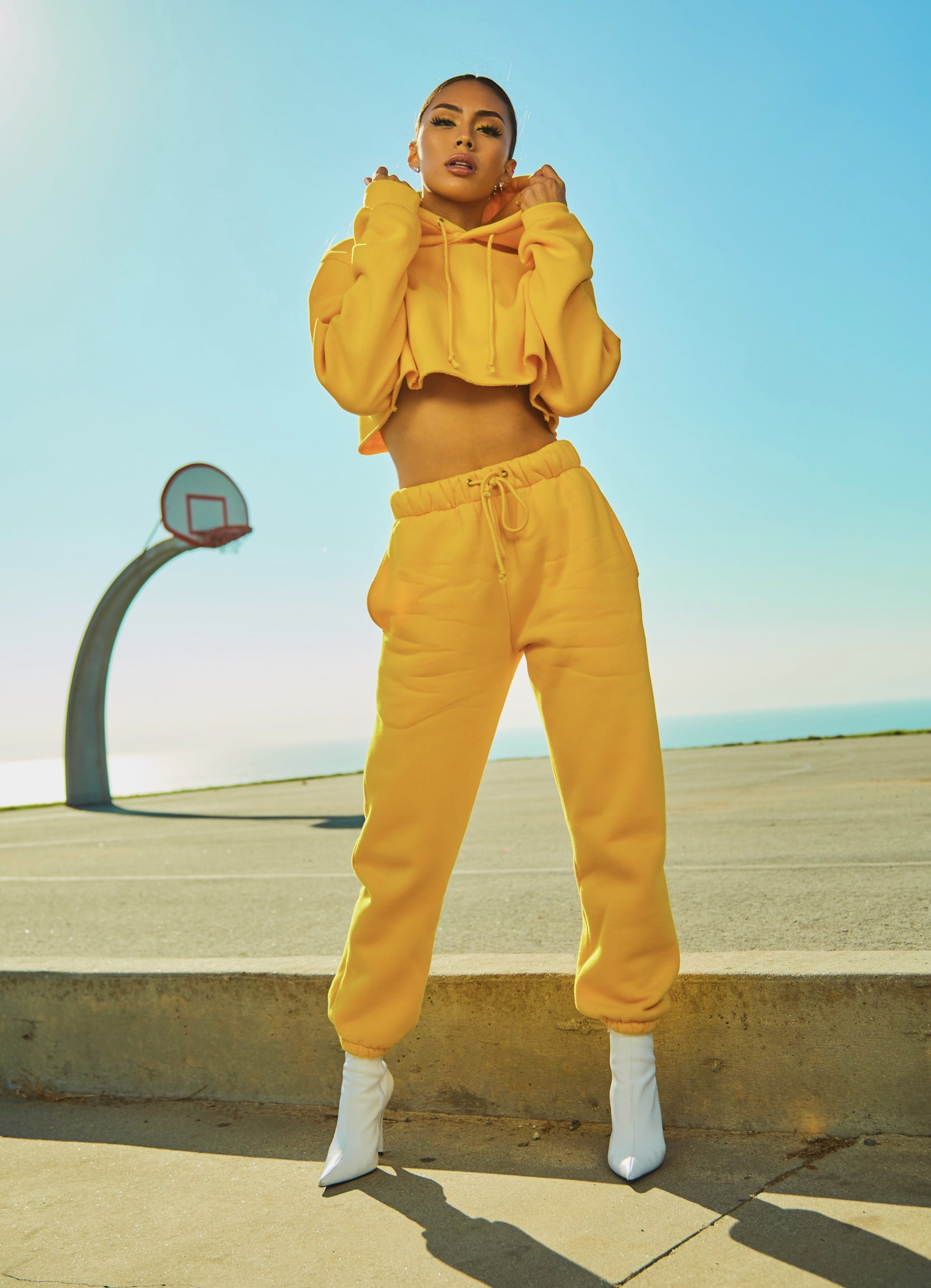 sky, front view, one person, real people, full length, woman, holding, outdoors, sweatsuit, tracksuit, view, hoodie, basketball, clear sky, land, fashion, Phone HD Wallpaper