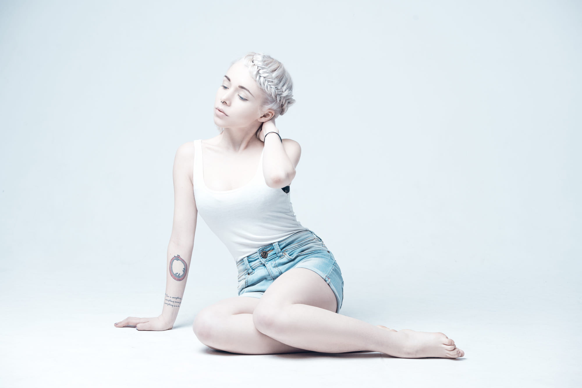 Sergey Yakubitskiy, nose rings, tattoo, platinum blonde, blue eyes, sitting, jean shorts, white tops, model, tank top, women, 1080P, hot pants, HD Wallpaper