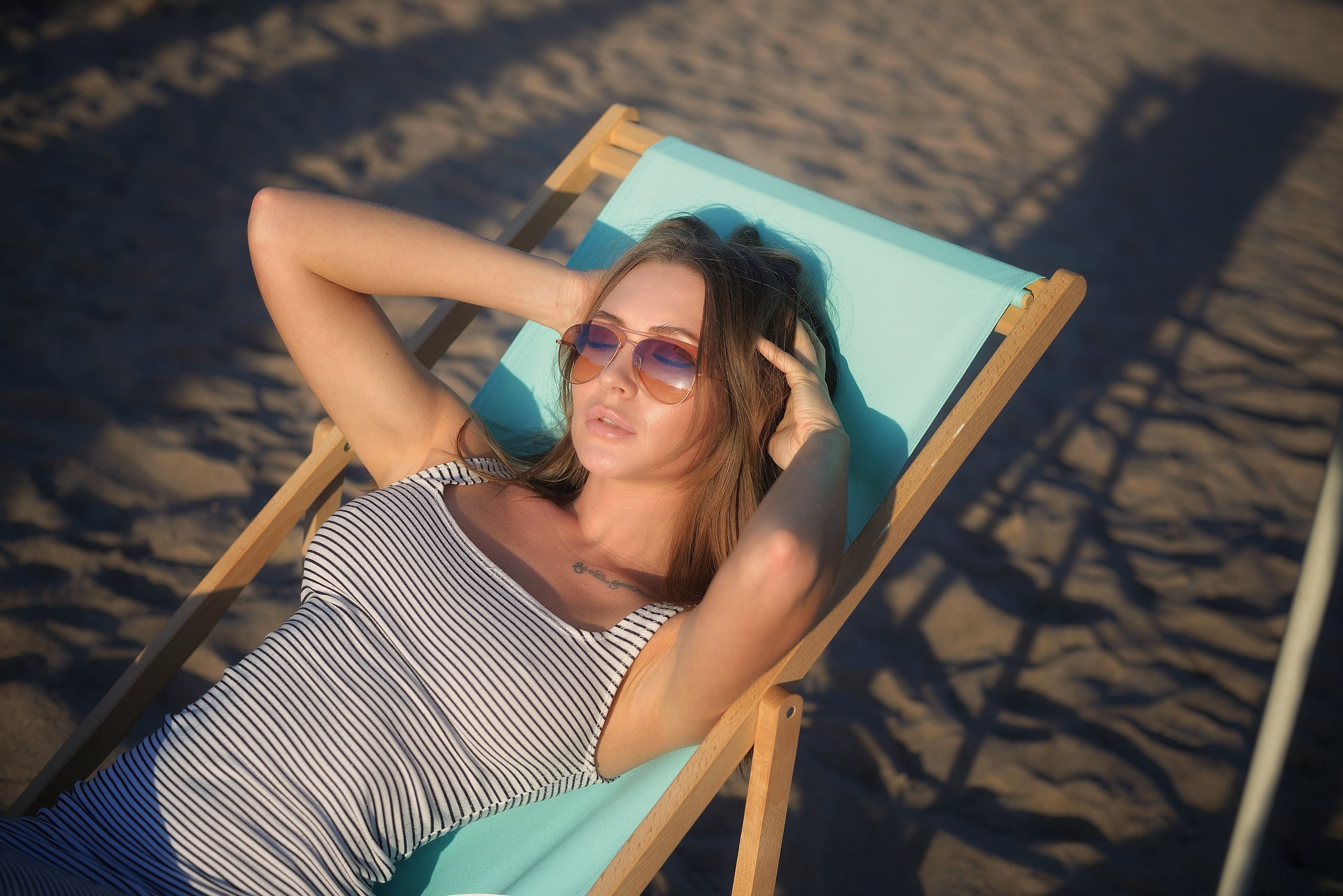 high angle view, leisure activity, outdoors, portrait, closed eyes, glasses, sunlight, black, fashion, sand, tattoo, tank, s, adult, sitting, lying down, HD Wallpaper
