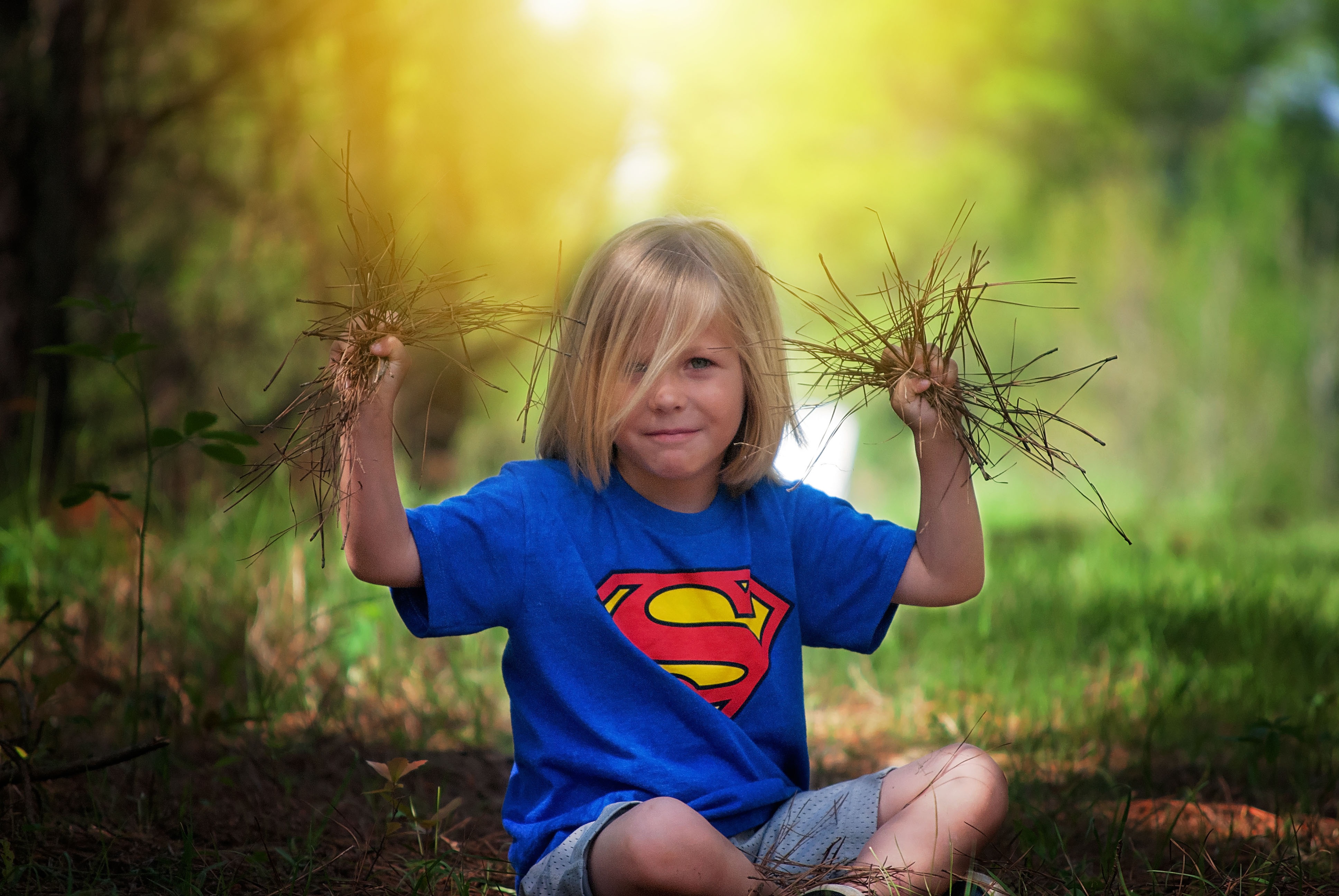 male, toddler, play, front view, caucasian Ethnicity, hair, little, happy, focus, superman, 4K, nature, land, pine straw, casual, childhood, women, superman t- shir, HD Wallpaper