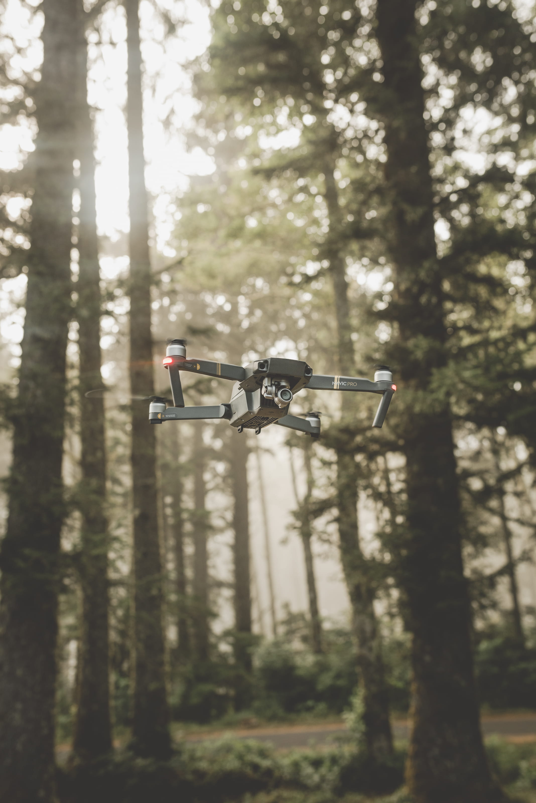 outdoors, color Image, helicopter, fly, daytime, equipment, surveillance, remote controlled, sky, camera - Photographic Equipment, flying, black, air, woodland, Phone HD Wallpaper