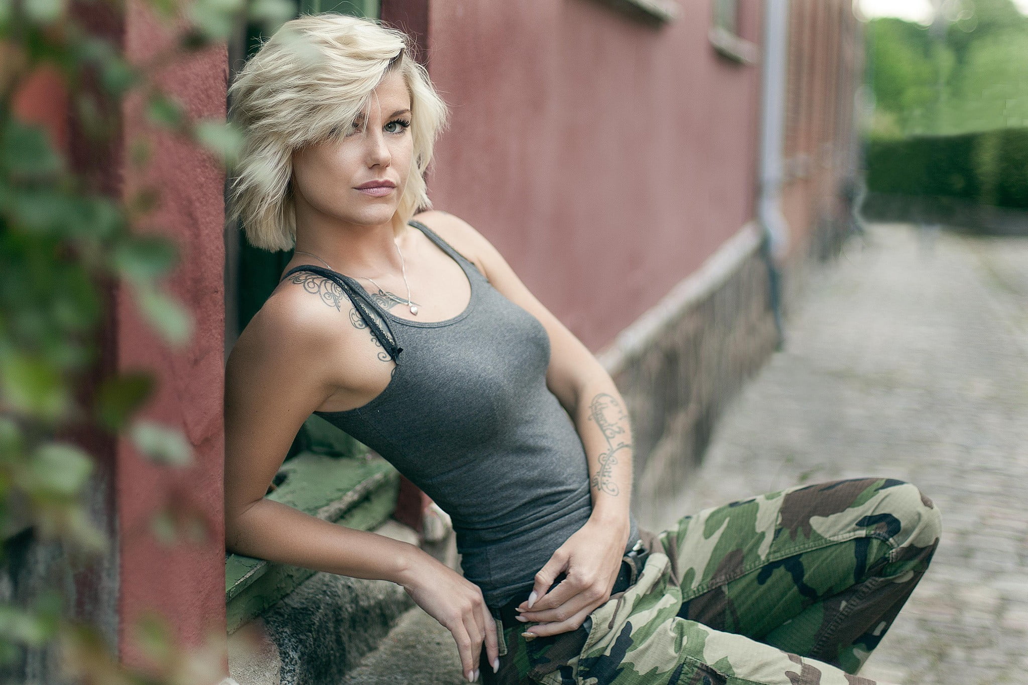 face, sitting, beautiful woman, looking, women outdoors, hairstyle, outdoors, looking away, real people, women, 1080P, short hair, day, portrait, cargo pants, HD Wallpaper