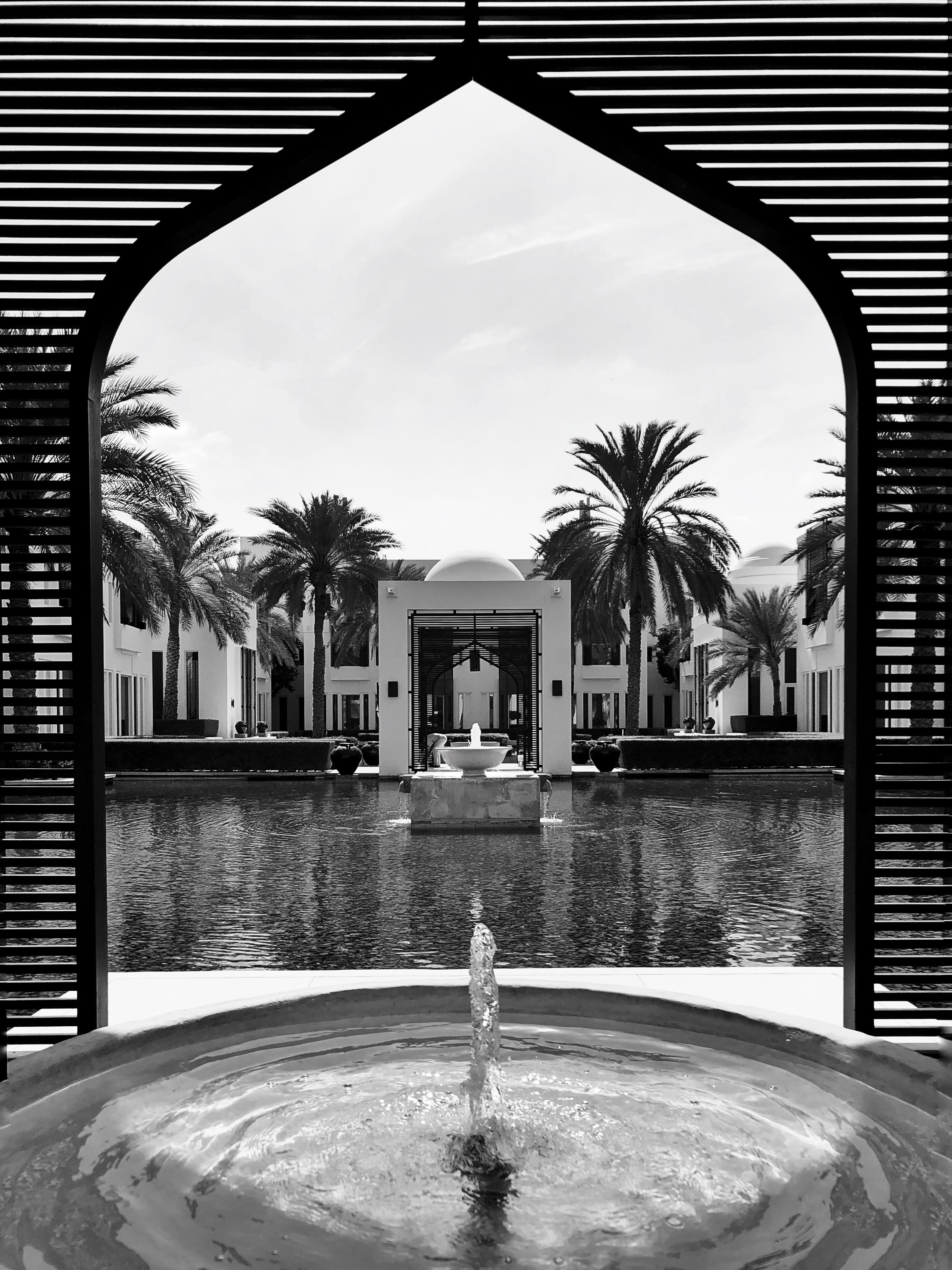 chedi hotel, water, arab, building exterior, peace, arch, resort, pool, swimming pool, fountain, sky, oman, building, no people, architecture, luxury, built structure, Phone HD Wallpaper