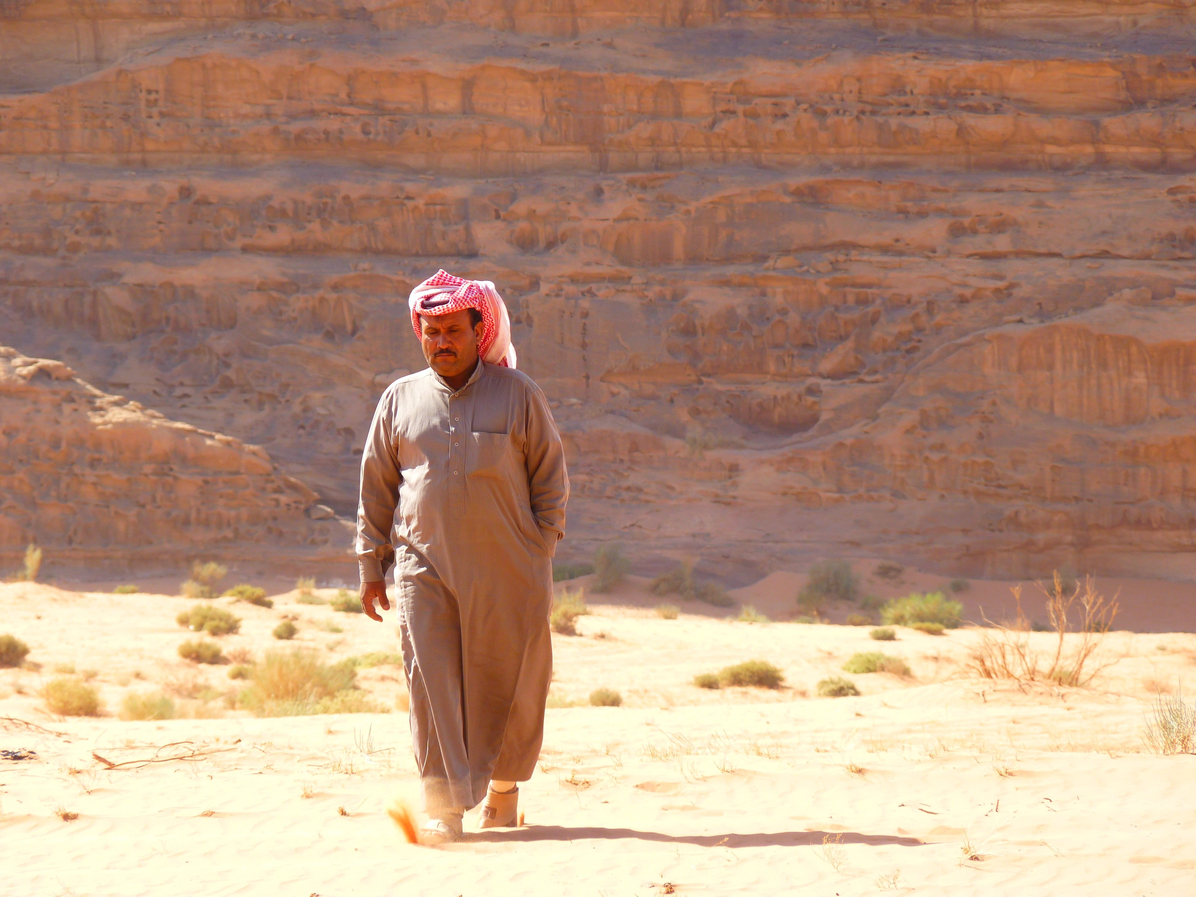lifestyles, human, day, Jordan, wearing, sunlight, land, clothing, Negev Desert, portrait, environment, arid climate, person, Wadi Rum, one person, front view, HD Wallpaper