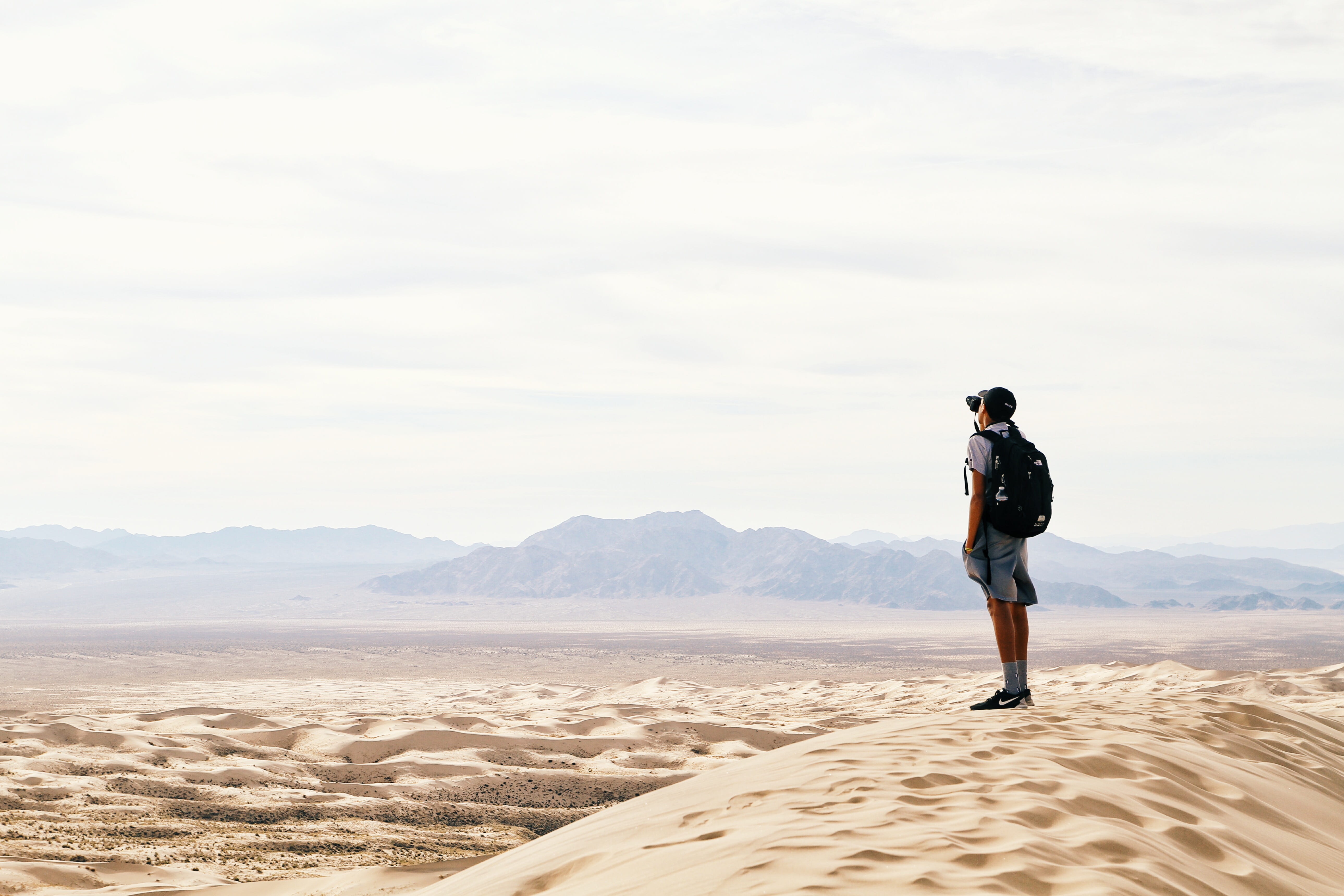 lifestyles, sand, sky, one woman only, man, backpack, mountain, arid climate, natural Phenomenon, caucasian Ethnicity, full Length, scenics - nature, time Of Day, HD Wallpaper