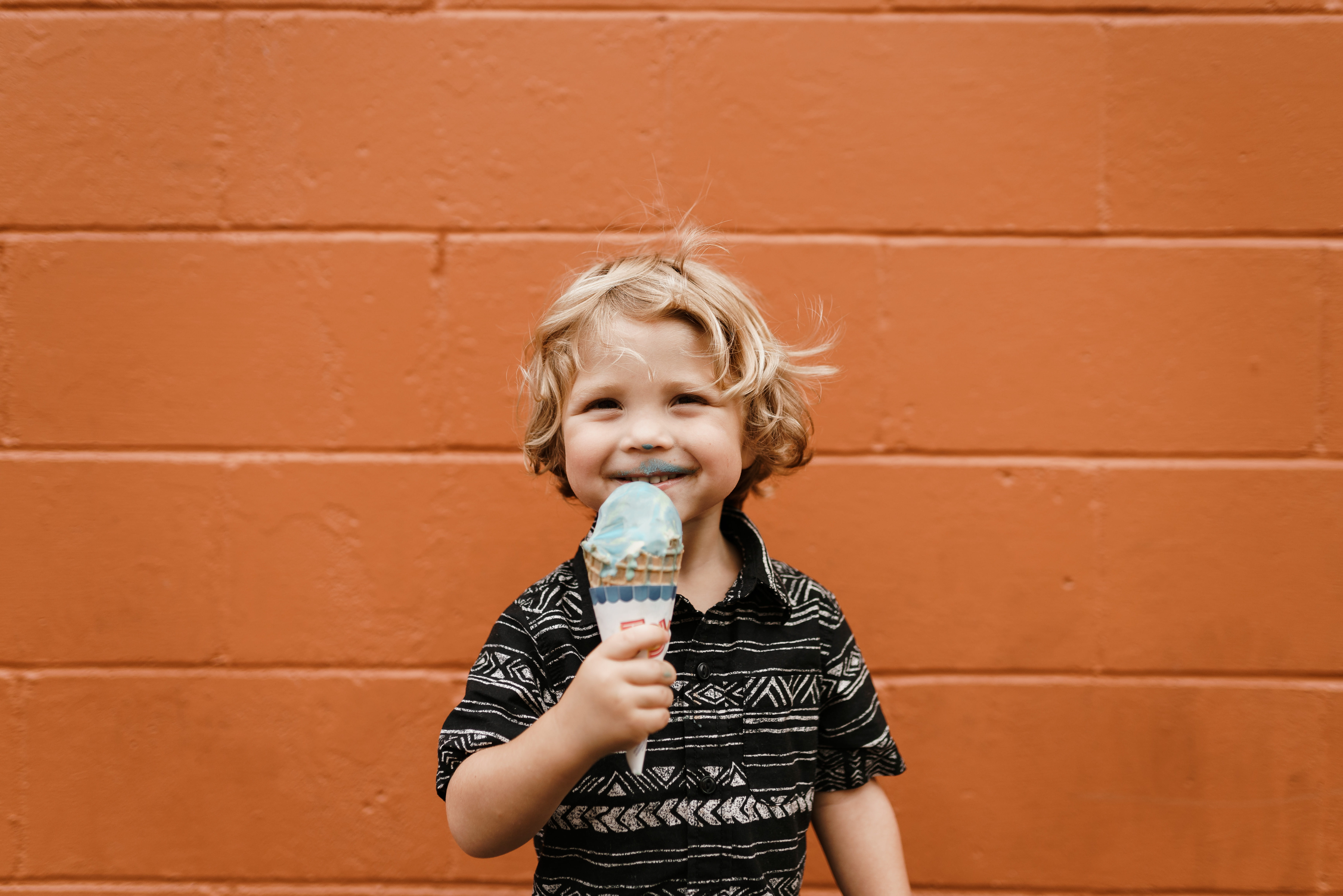 outdoors, sweet food, holding, real people, innocence, wall - building feature, 5K, front view, kid, eating, frozen food, girls, hair, frozen, portrait, HD Wallpaper