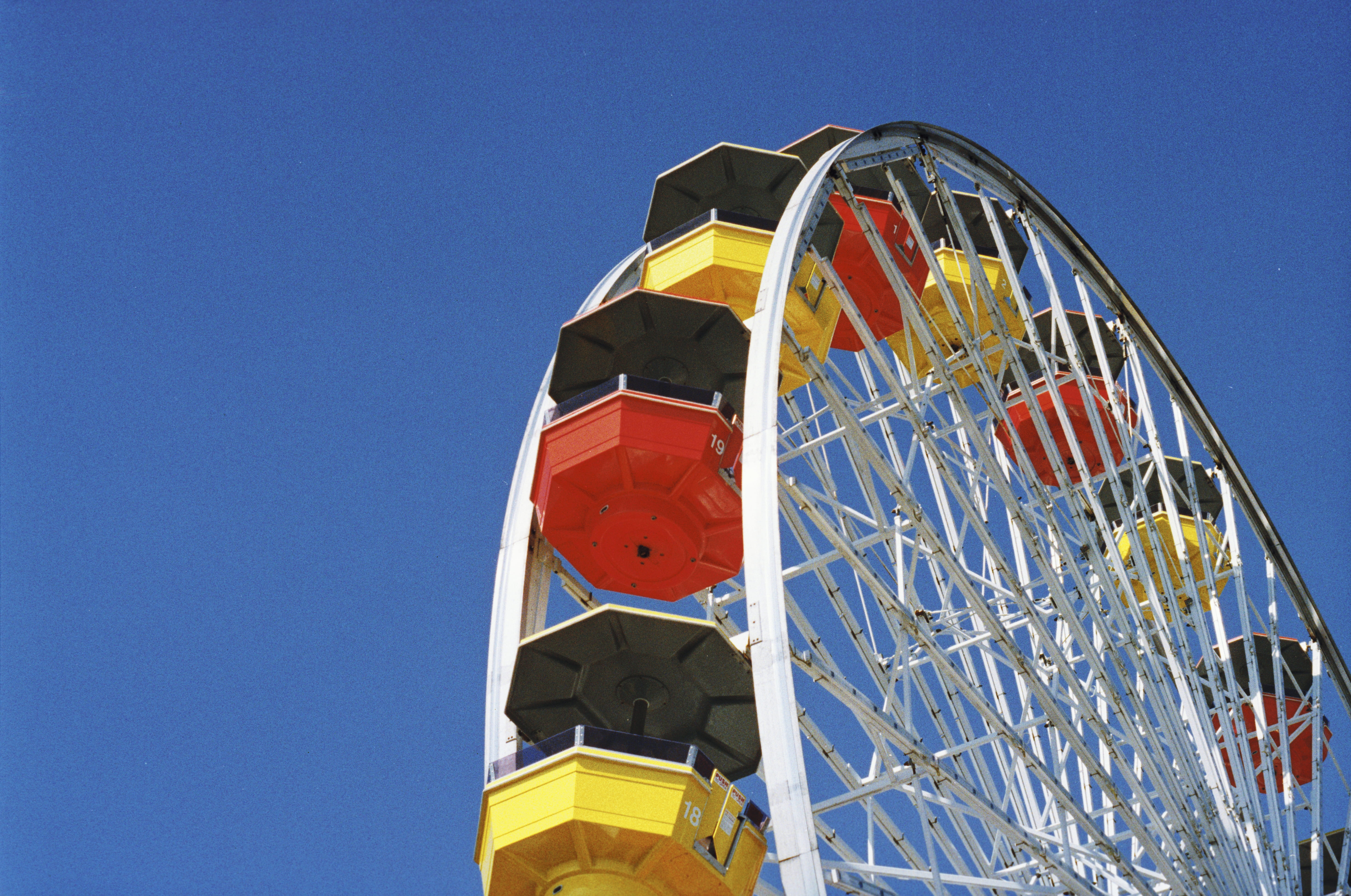 multi colored, yellow, low angle view, color, amusement park, vintage, architecture, arts culture and entertainment, california, 5K, fun, 35mm, sunlight, HD Wallpaper