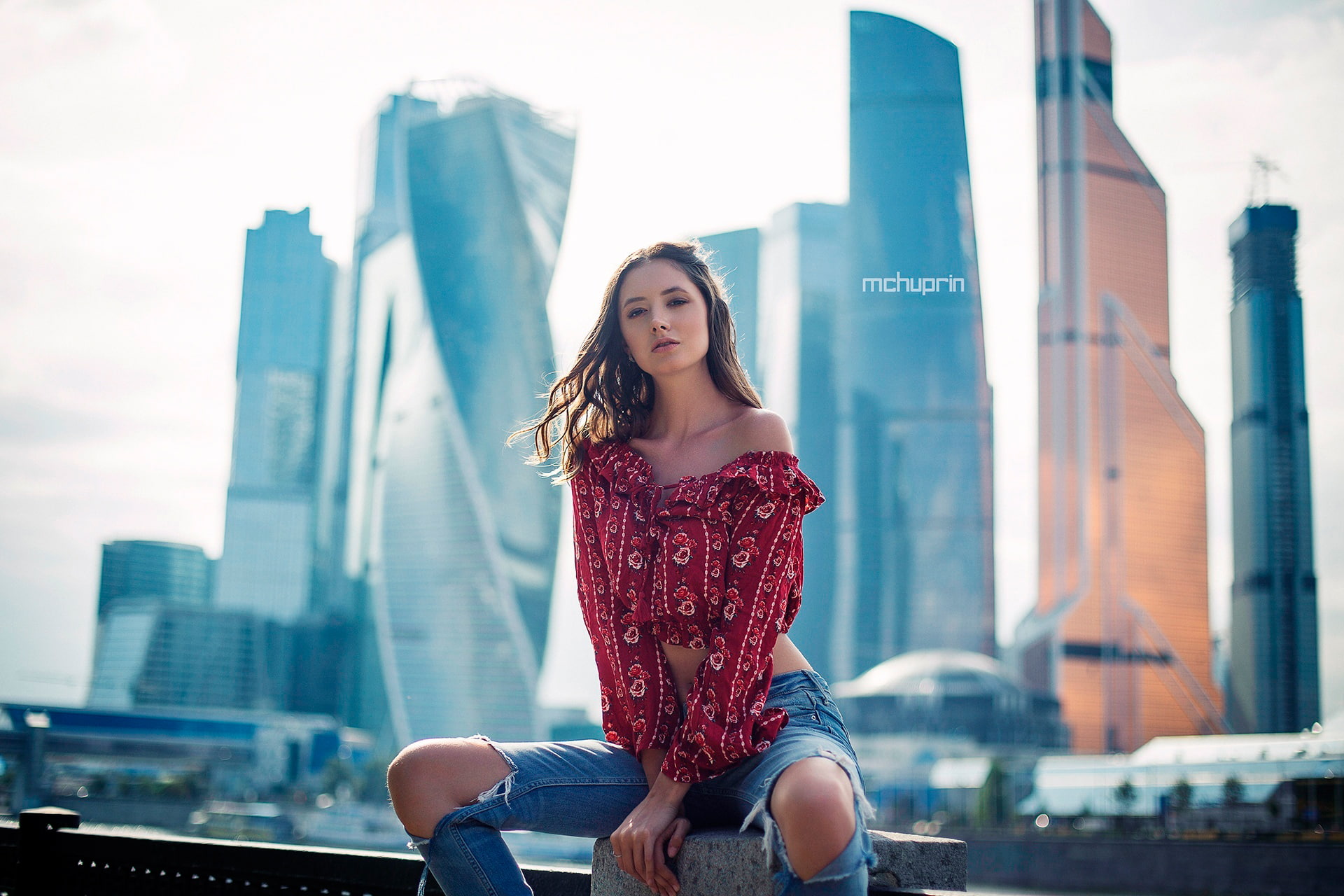 sitting, outdoors, fashion, built structure, office building exterior, 1080P, adult, beautiful woman, city, skyscraper, hair, torn jeans, positive emotion, HD Wallpaper