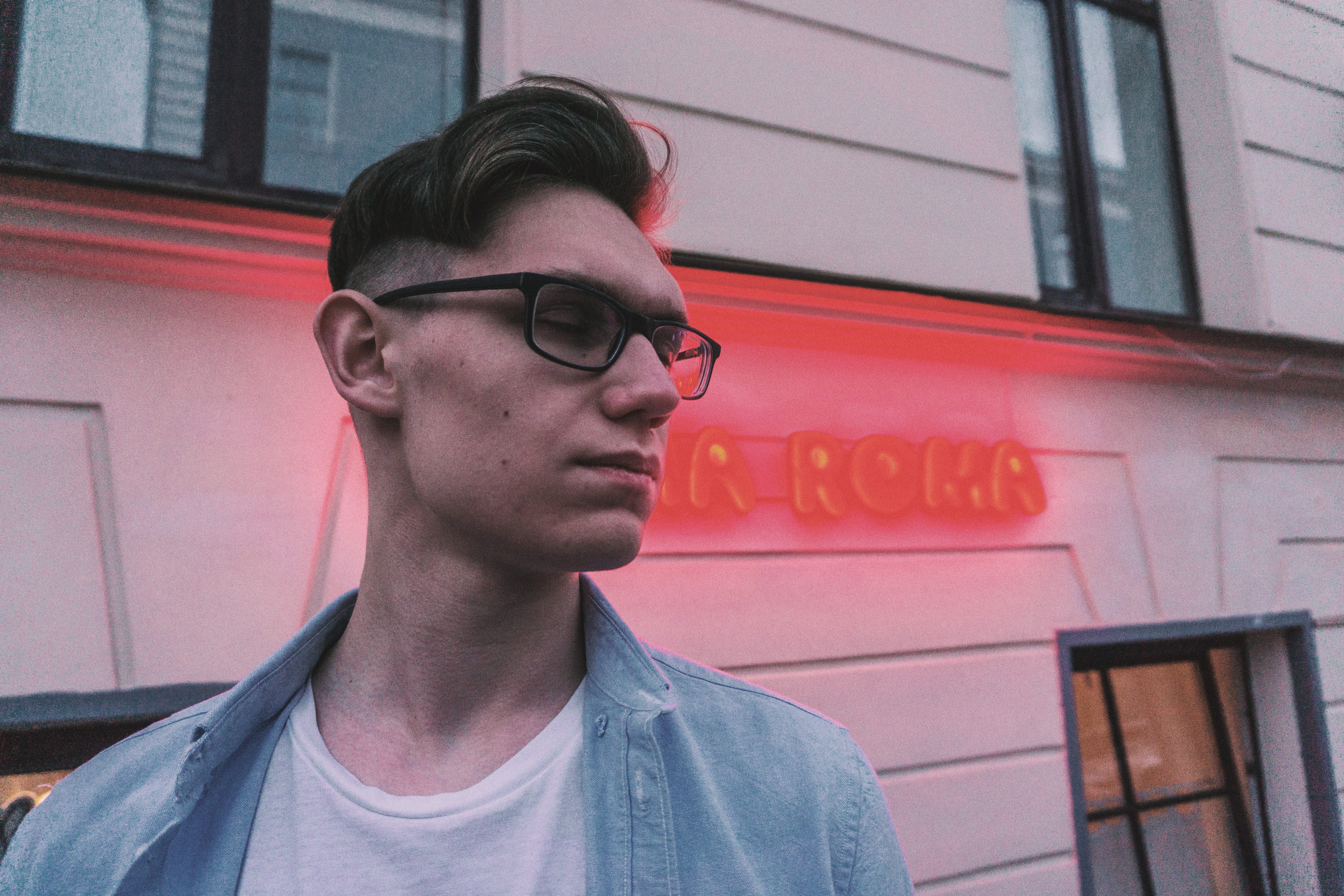 pale, front view, one person, real people, young men, text, day, outdoors, eyeglasses, night, looking, neon, casual clothing, street, glasses, blue, leisure activity, HD Wallpaper