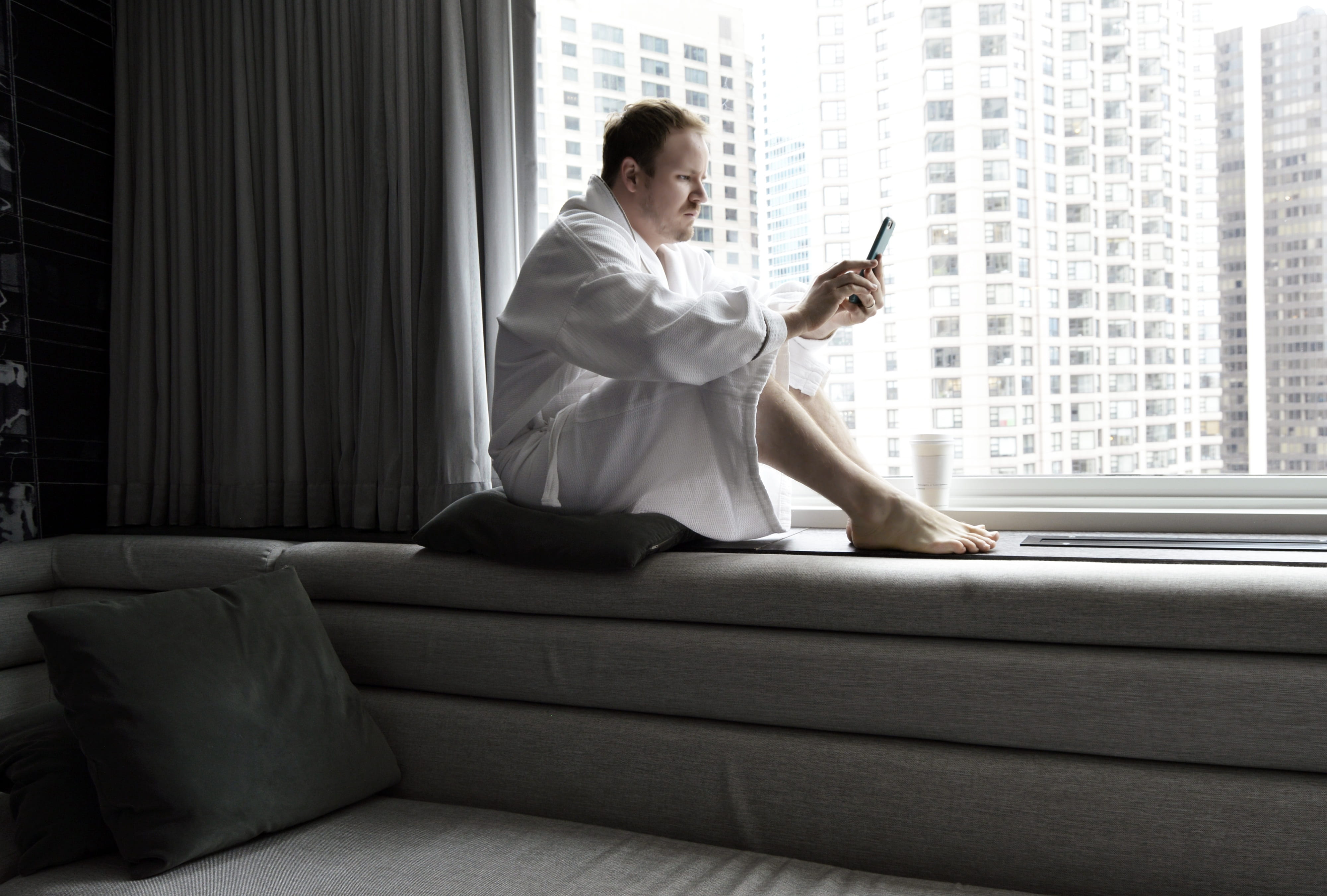 resort, caucasian, text, view, men, wireless technology, large, one person, room, white, curtains, holding, guy, full length, coffee, reading, beautiful, HD Wallpaper