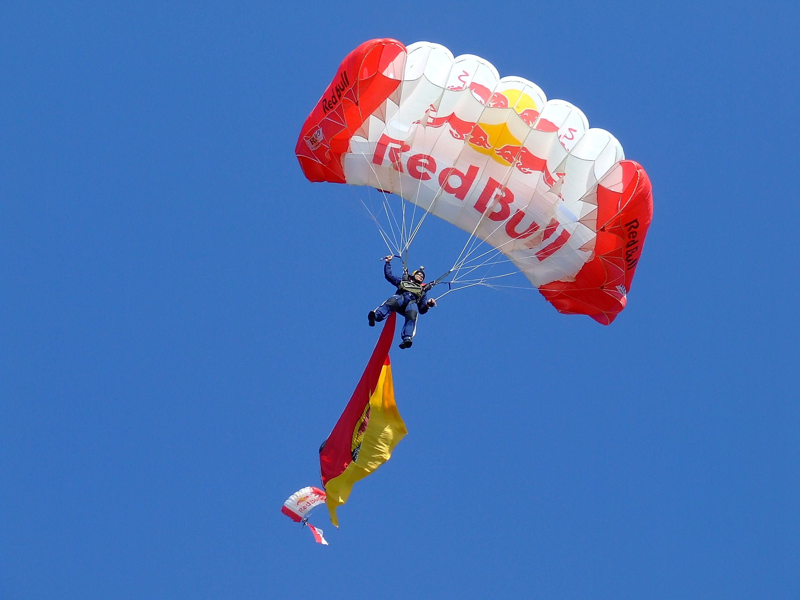joy, day, leisure activity, freedom, mid-air, motion, blue, parasailing, multi colored, outdoors, skydive, adventure, parachuting, red bull, flight, glider, HD Wallpaper